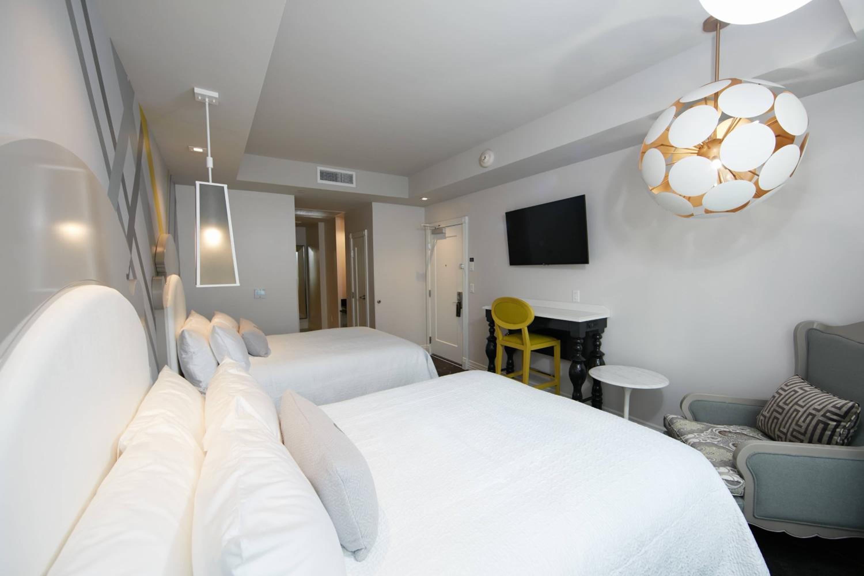 Queen Room With Two Queen Beds and City View - Hearing Accessible photo 1