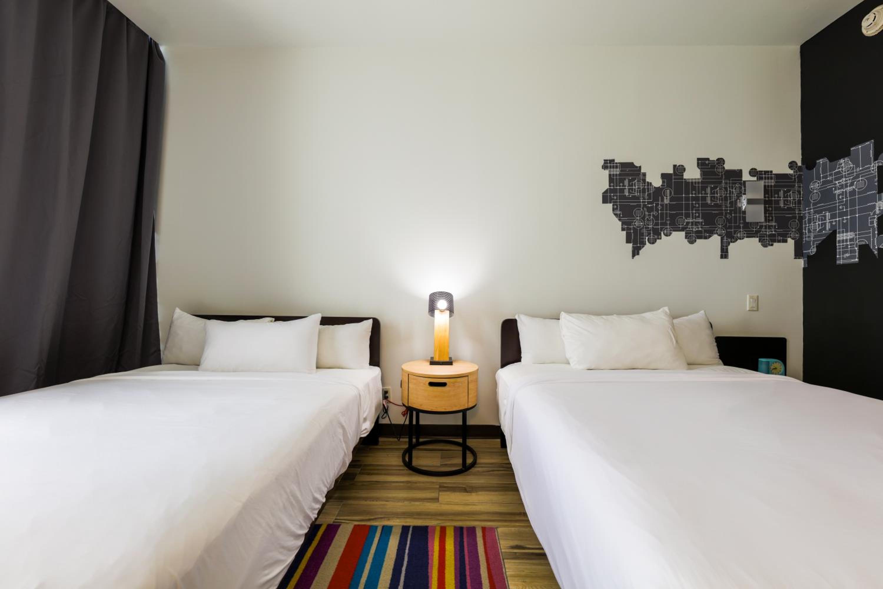Guest Room with Two Queen Beds and Balcony - Photo 5