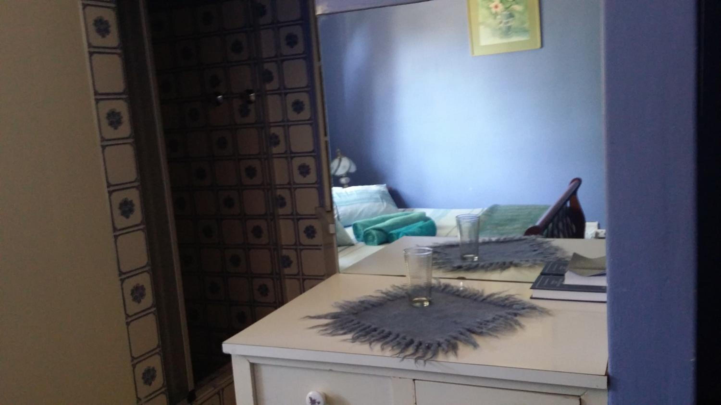 Economy Quadruple Room - Photo 4