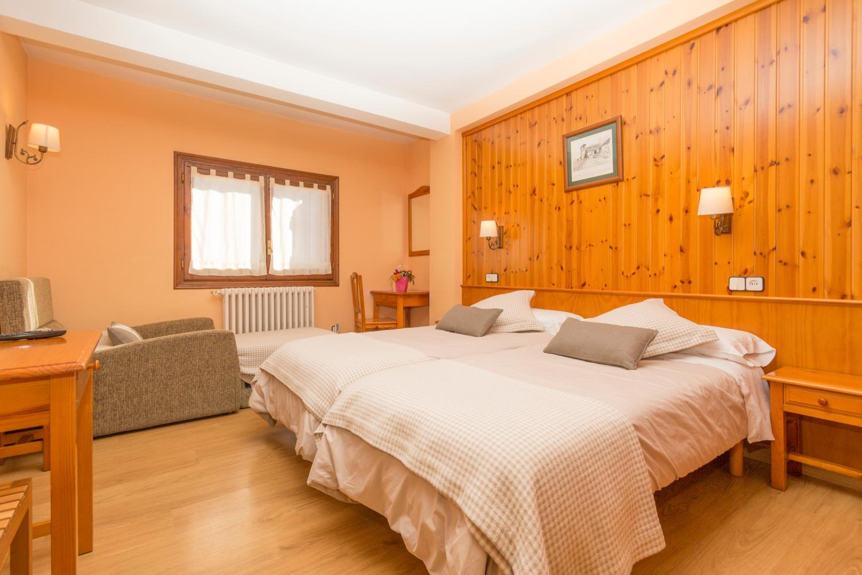 Habitación triple (2 adultos + 1 niño)