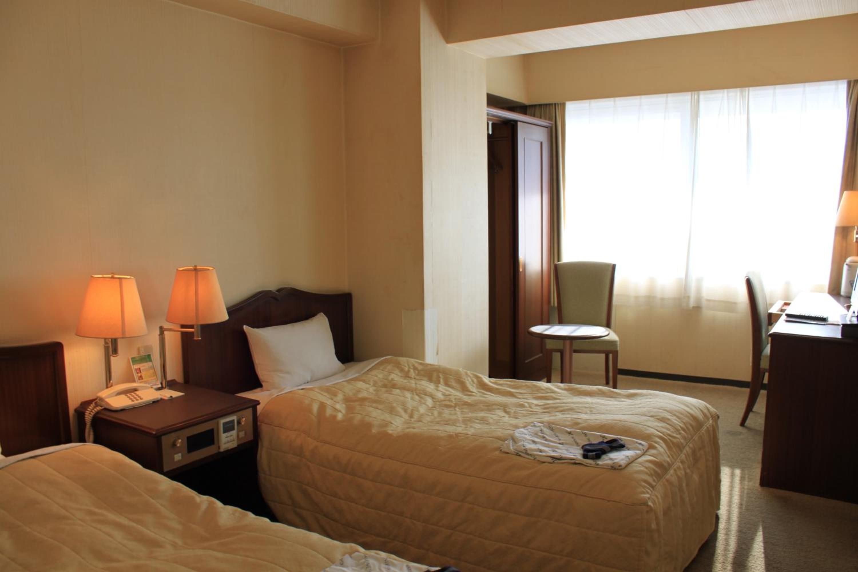 Standard Twin Room - Photo 9