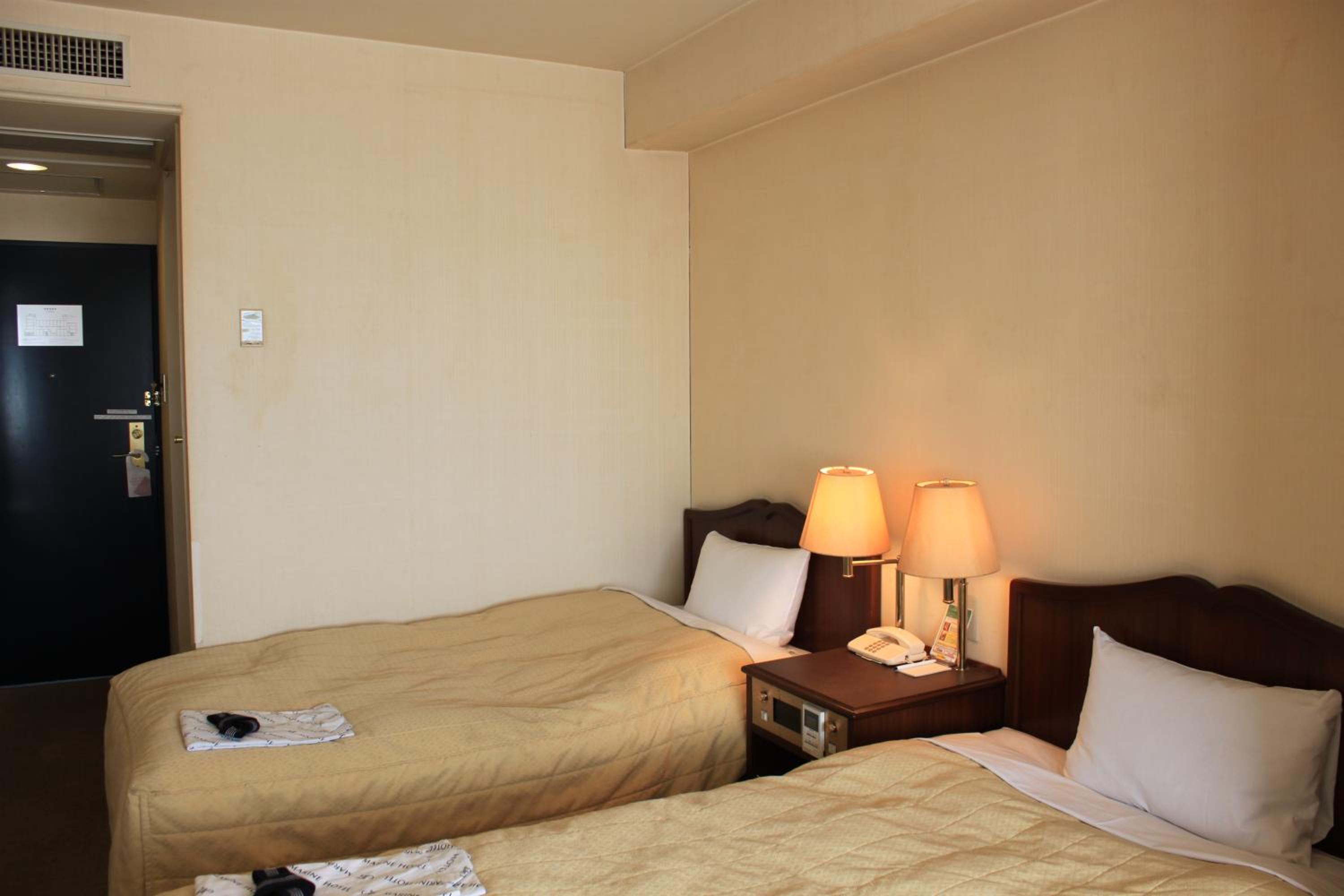 Standard Twin Room - Photo 7
