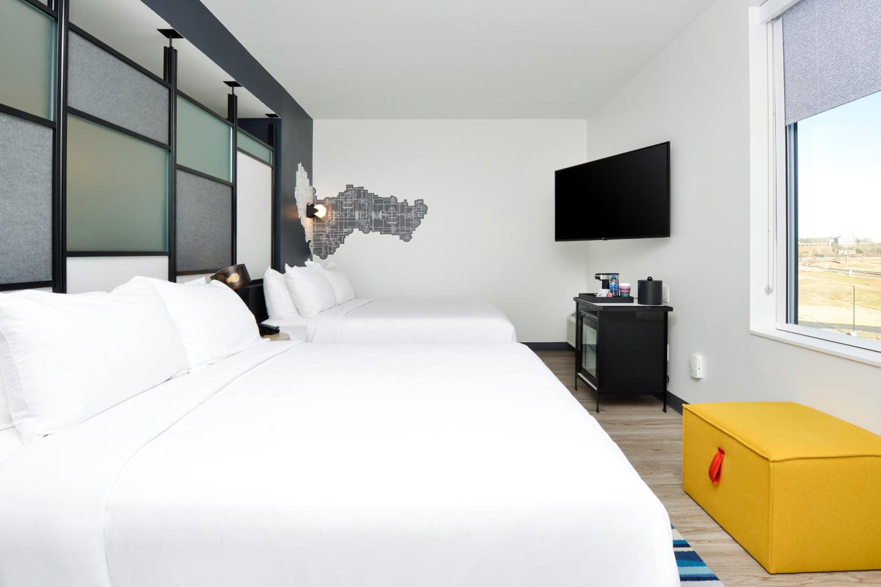Queen Room with Two Queen Beds - Hearing Accessible photo 1