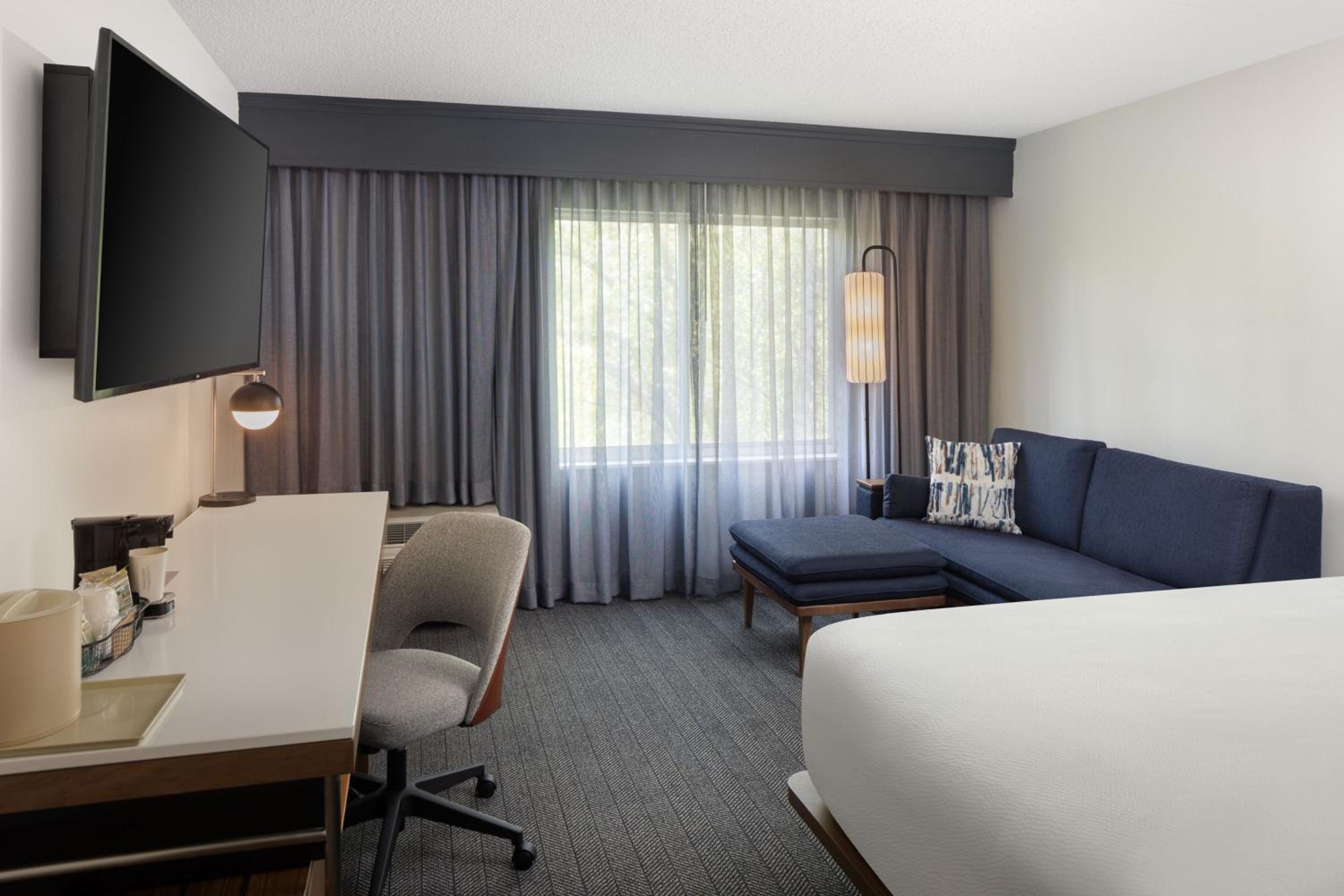 King Room with Sofa Bed and Roll-in Shower - Mobility and Hearing Accessible