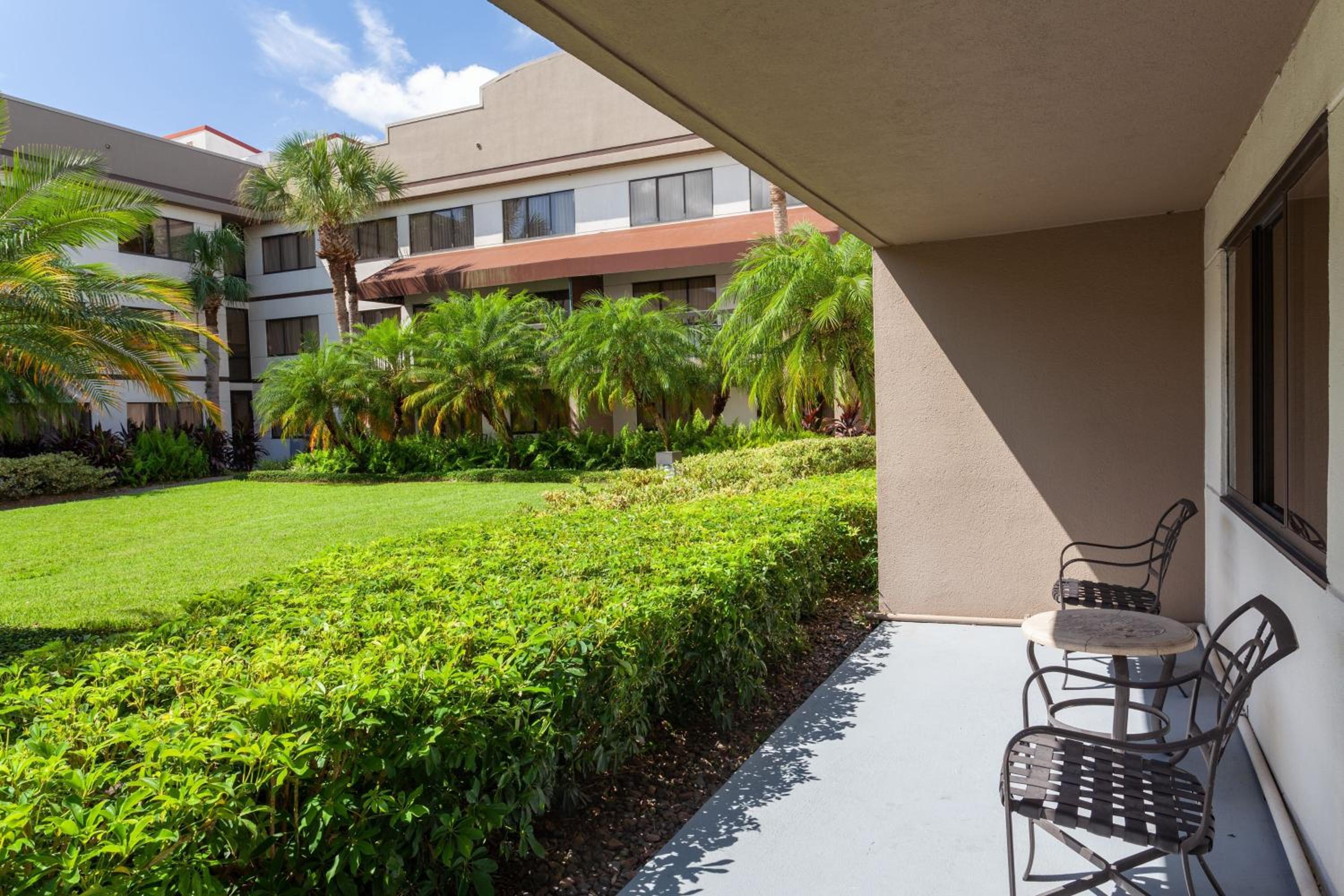 One-Bedroom Suite with Balcony and Pool View