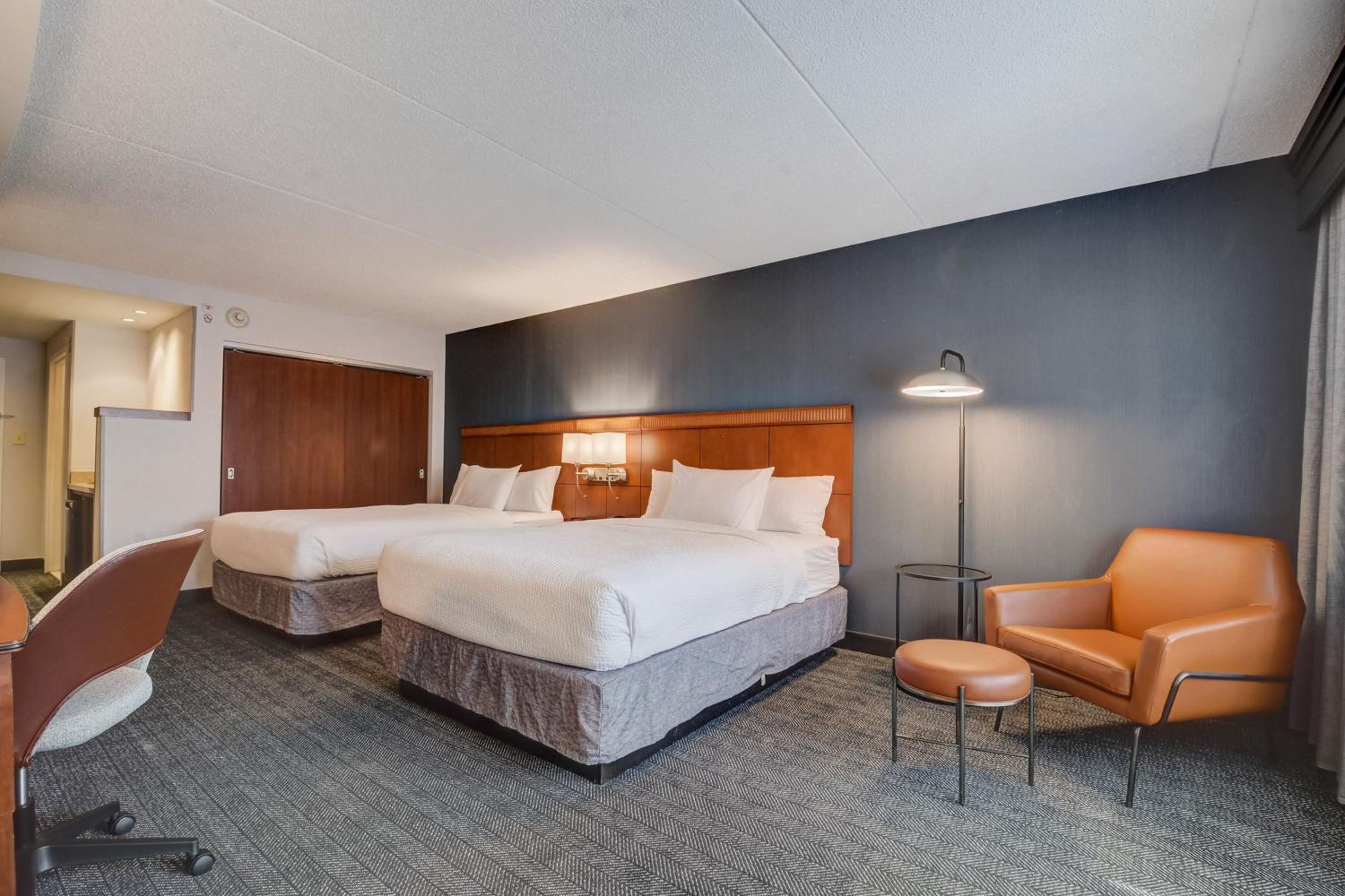 Queen Room with Two Queen Beds - Hearing Accessible photo 1