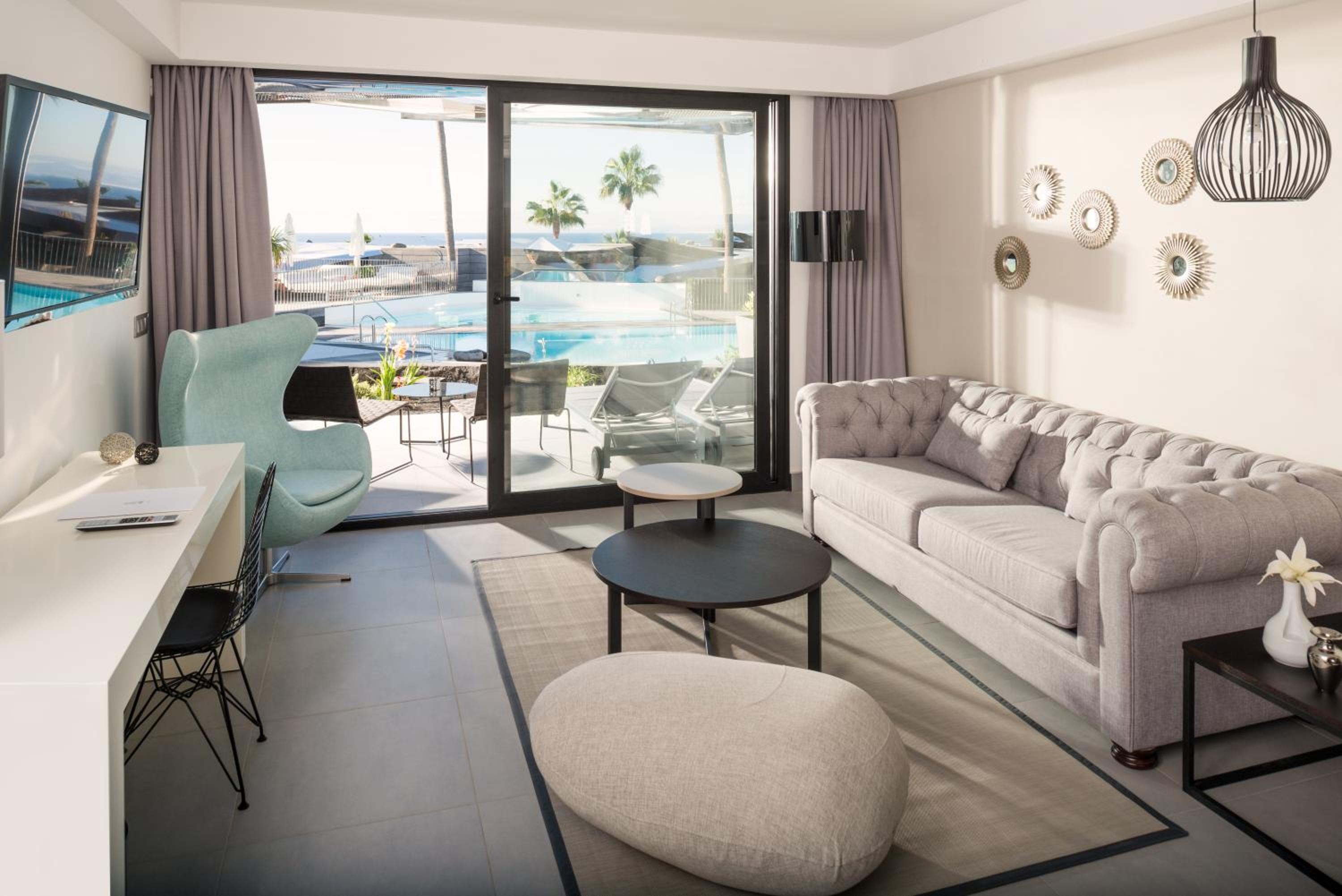 Junior Suite with Pool View (2 Guests) - Photo 1