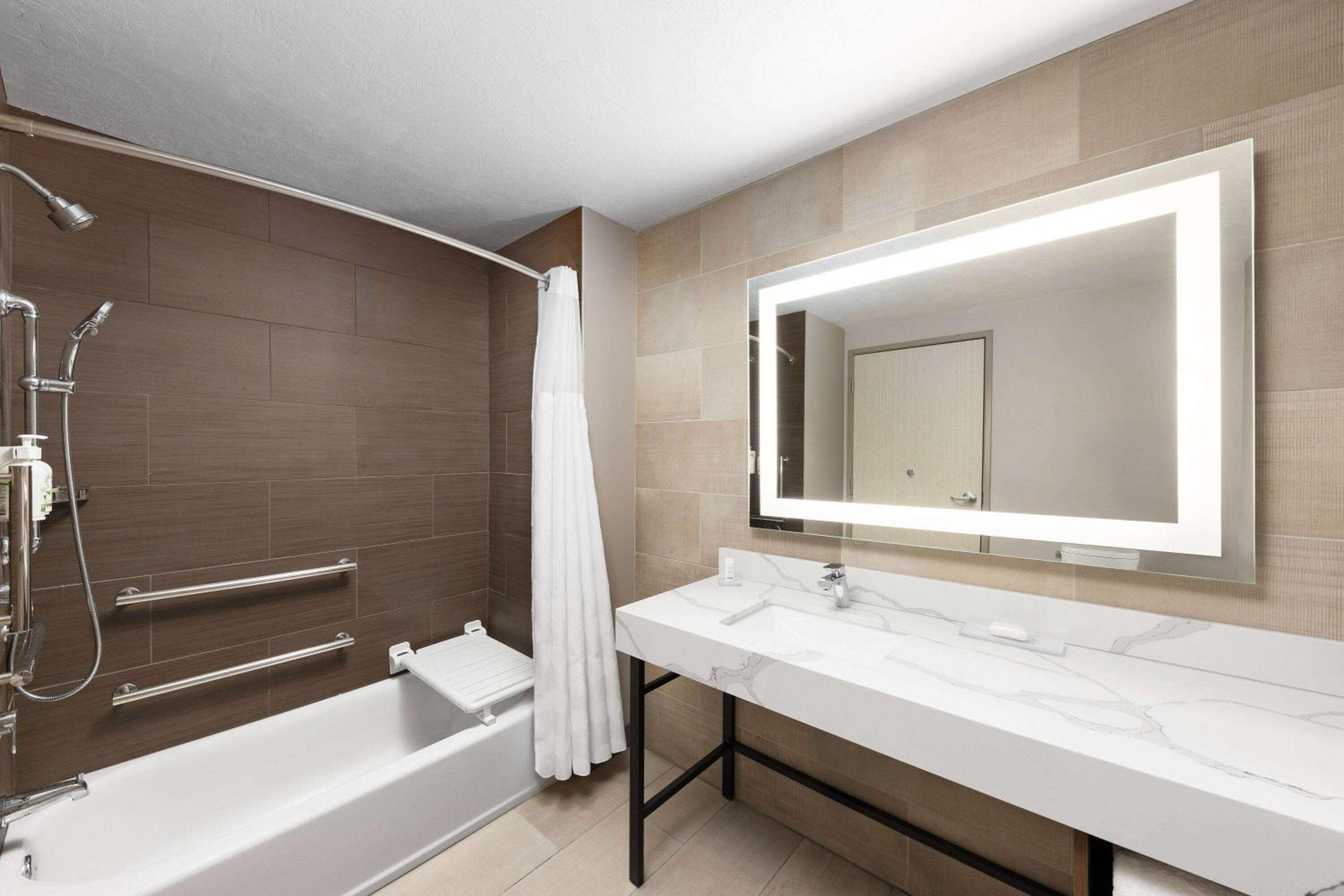 King Room with Tub w/ Grab Bars and Sofa Bed - Mobility/Hearing Accessible - Non-Smoking