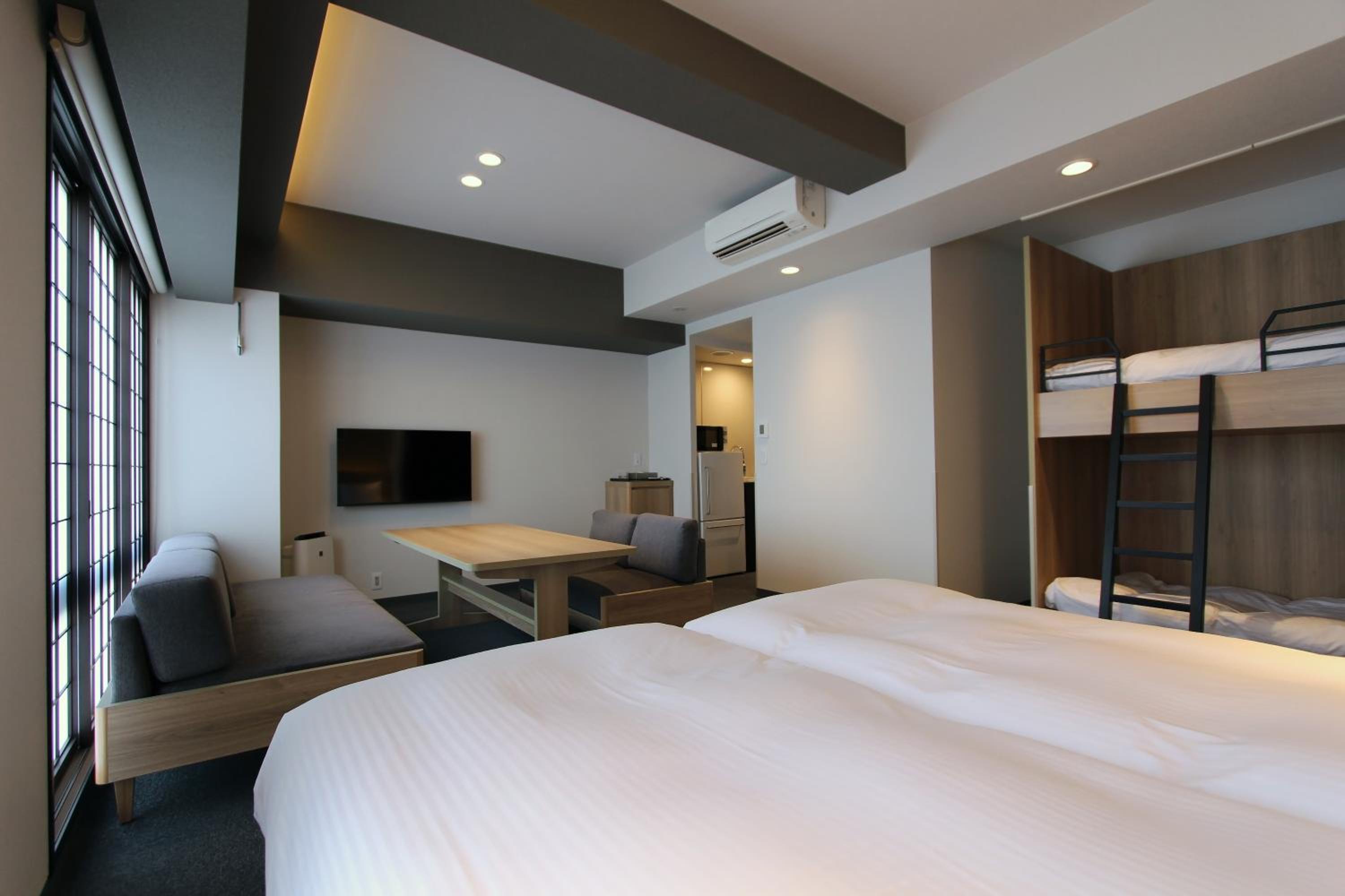 Deluxe Bunk Bed Room - Non-Smoking - Photo 16