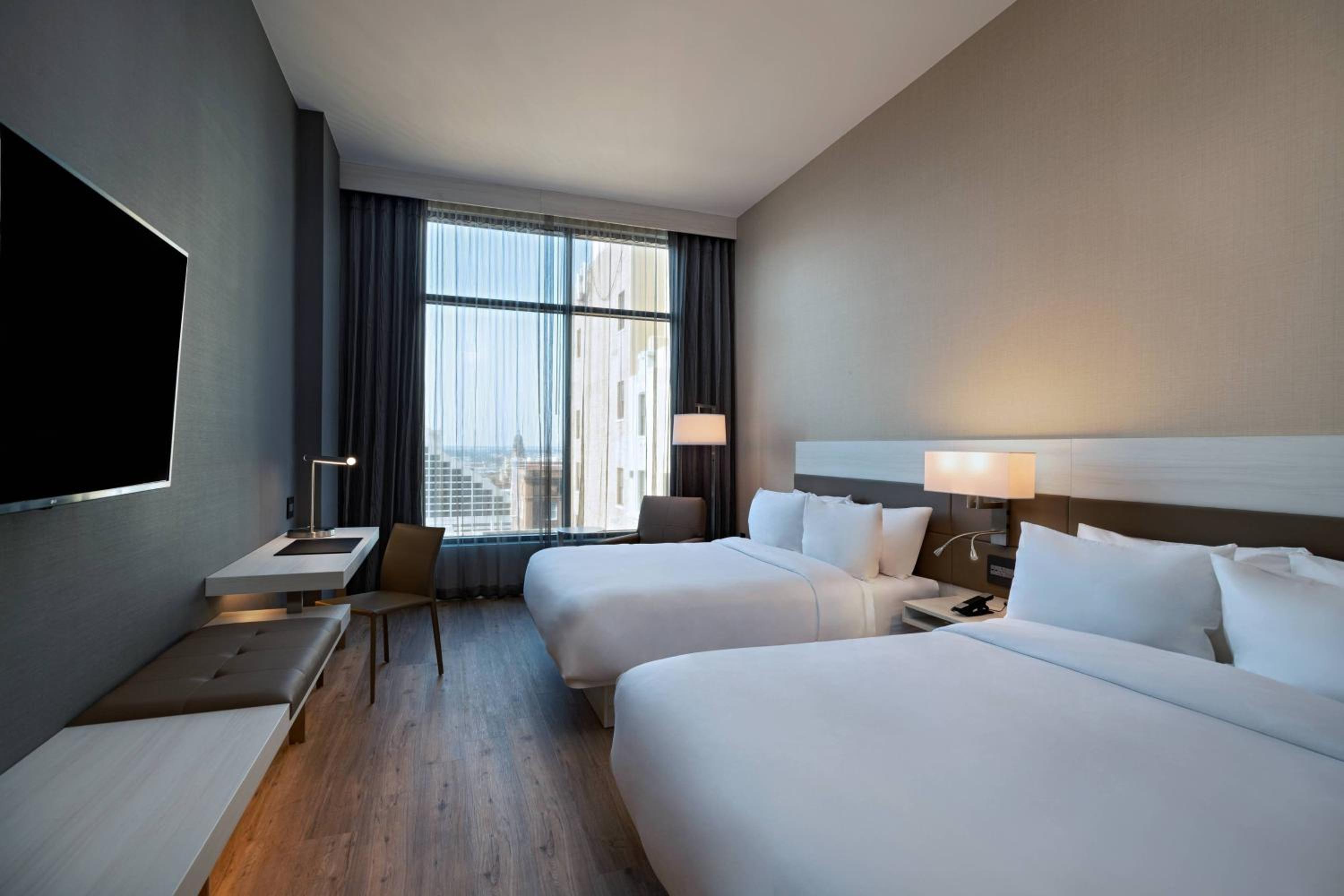 Queen Room with Two Queen Beds - Hearing Accessible - Photo 1