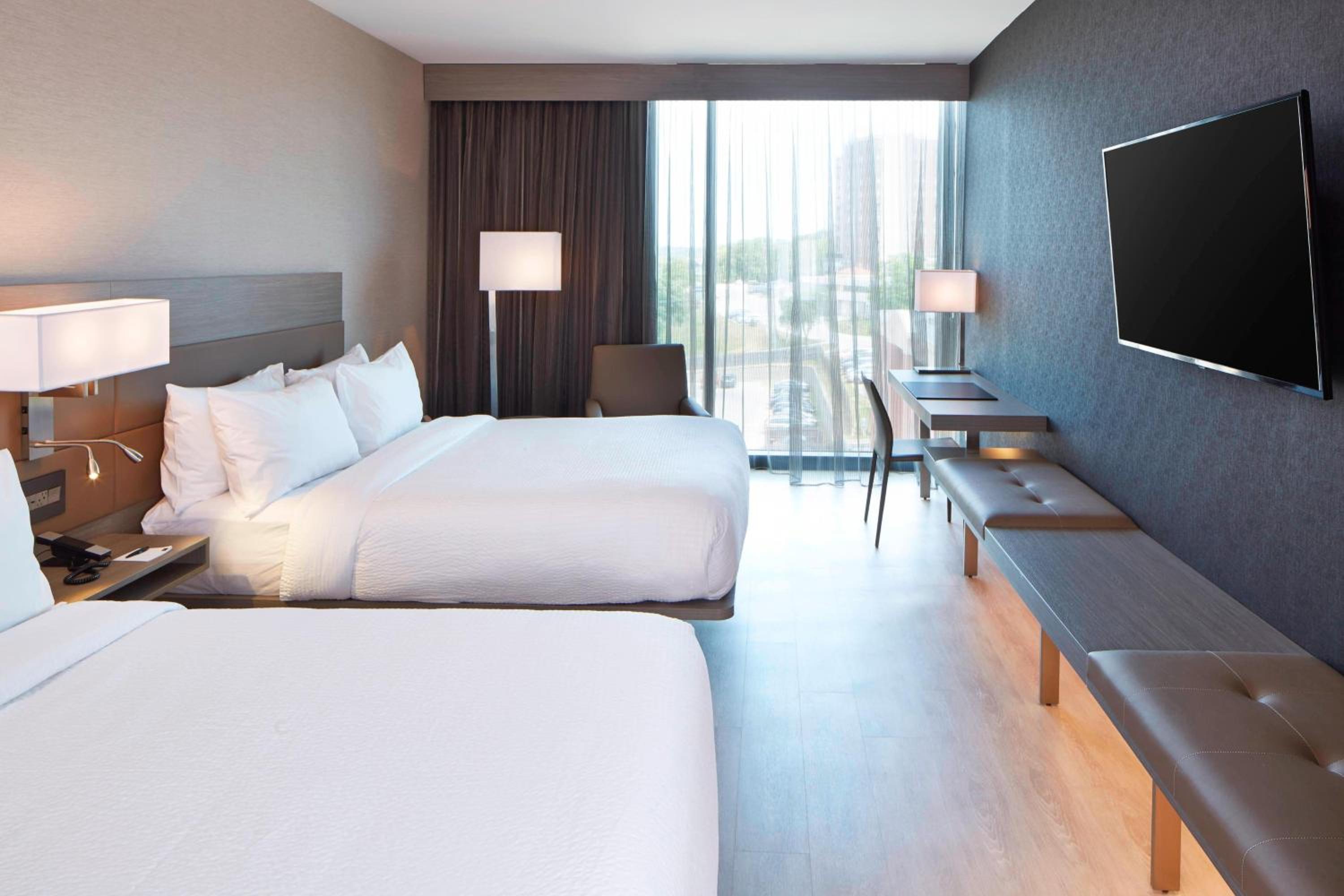 Queen Room with Two Queen Beds and Roll-in Shower - Mobility and Hearing Accessible photo 1