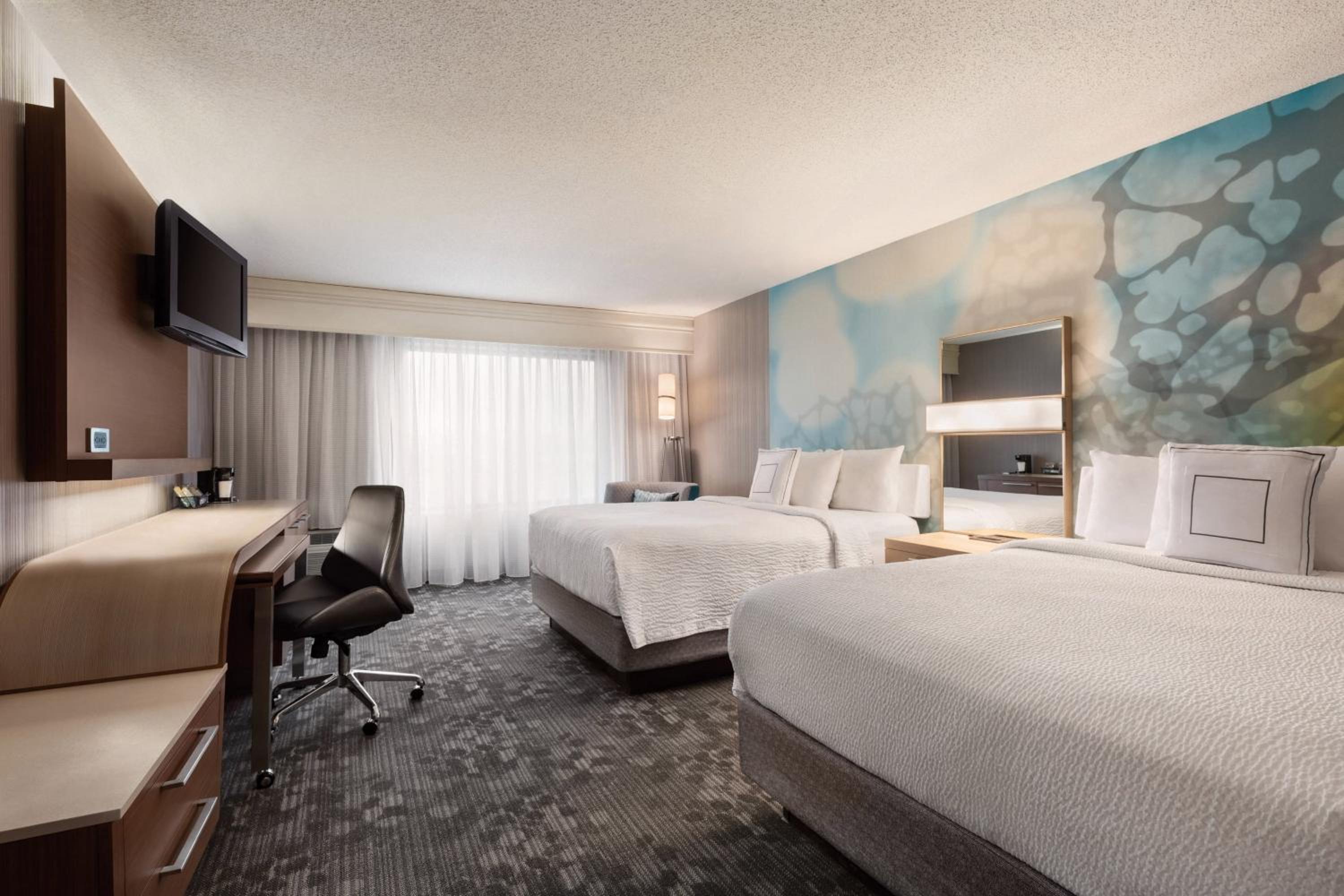 Queen Room with Two Queen Beds - Photo 1