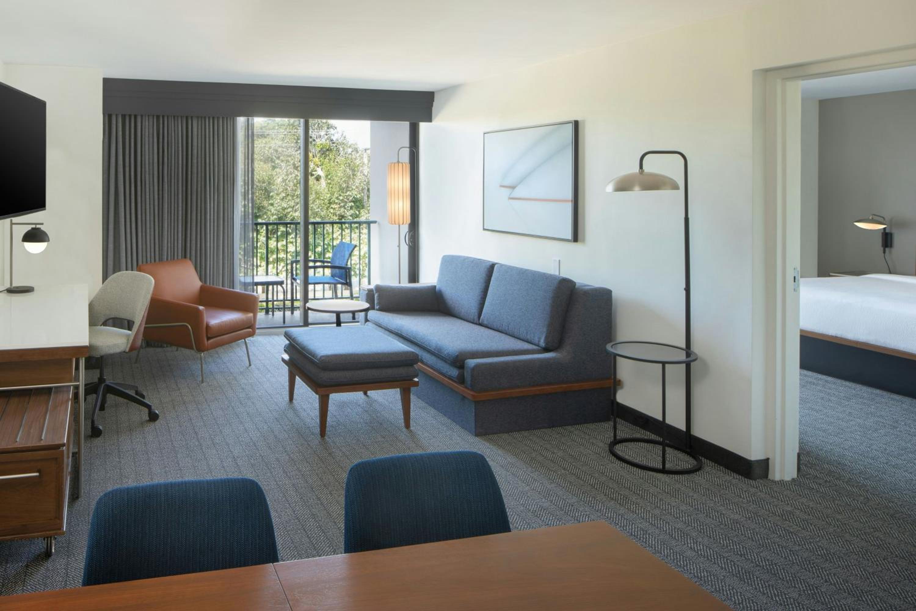 One-Bedroom King Suite with Sofa Bed, Balcony and Roll-In Shower - Mobility and Hearing Accessible
