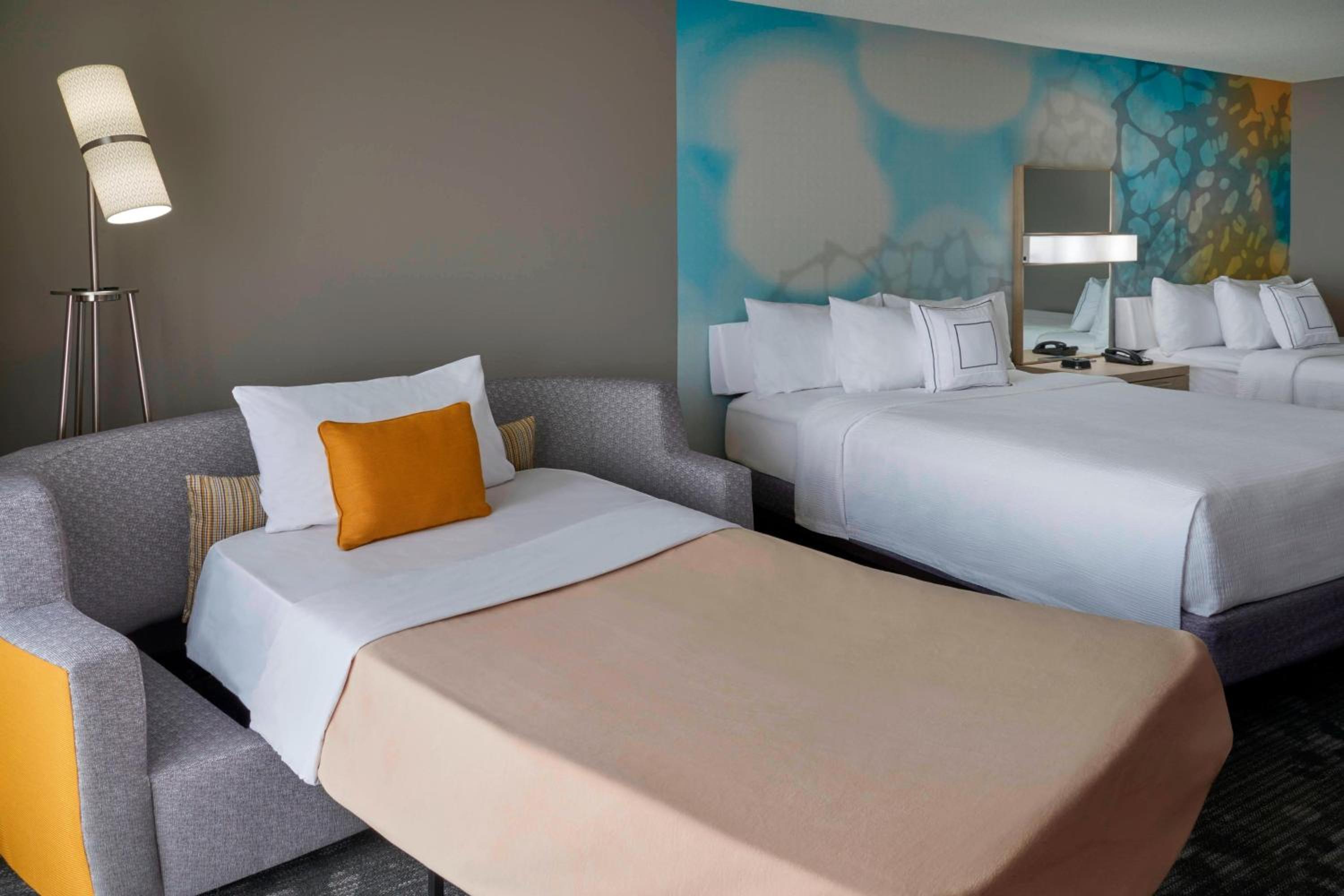 Larger Queen Room with Two Queen Beds and Sofa Bed - Photo 3