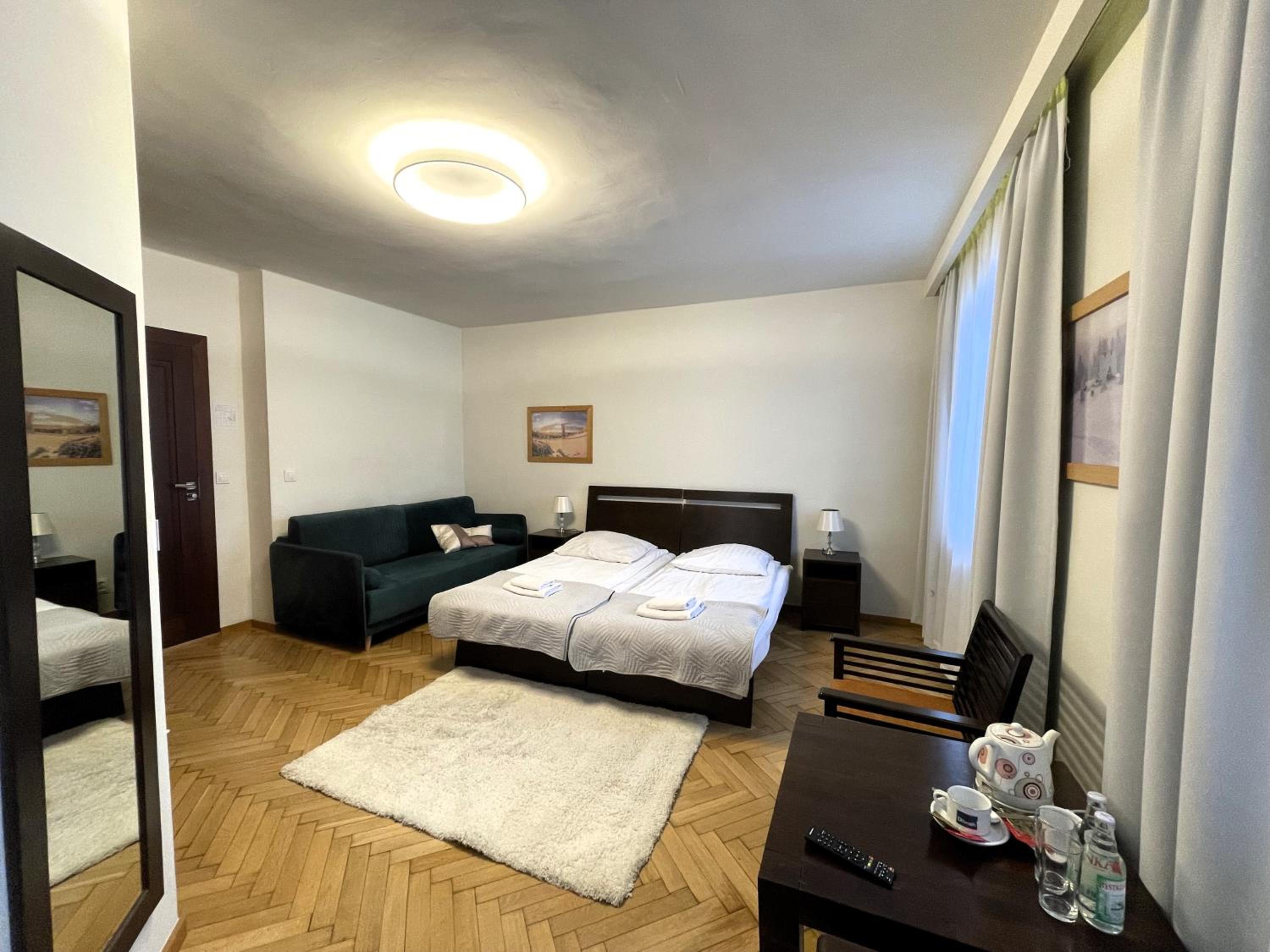 Deluxe Quadruple Room - Photo 2