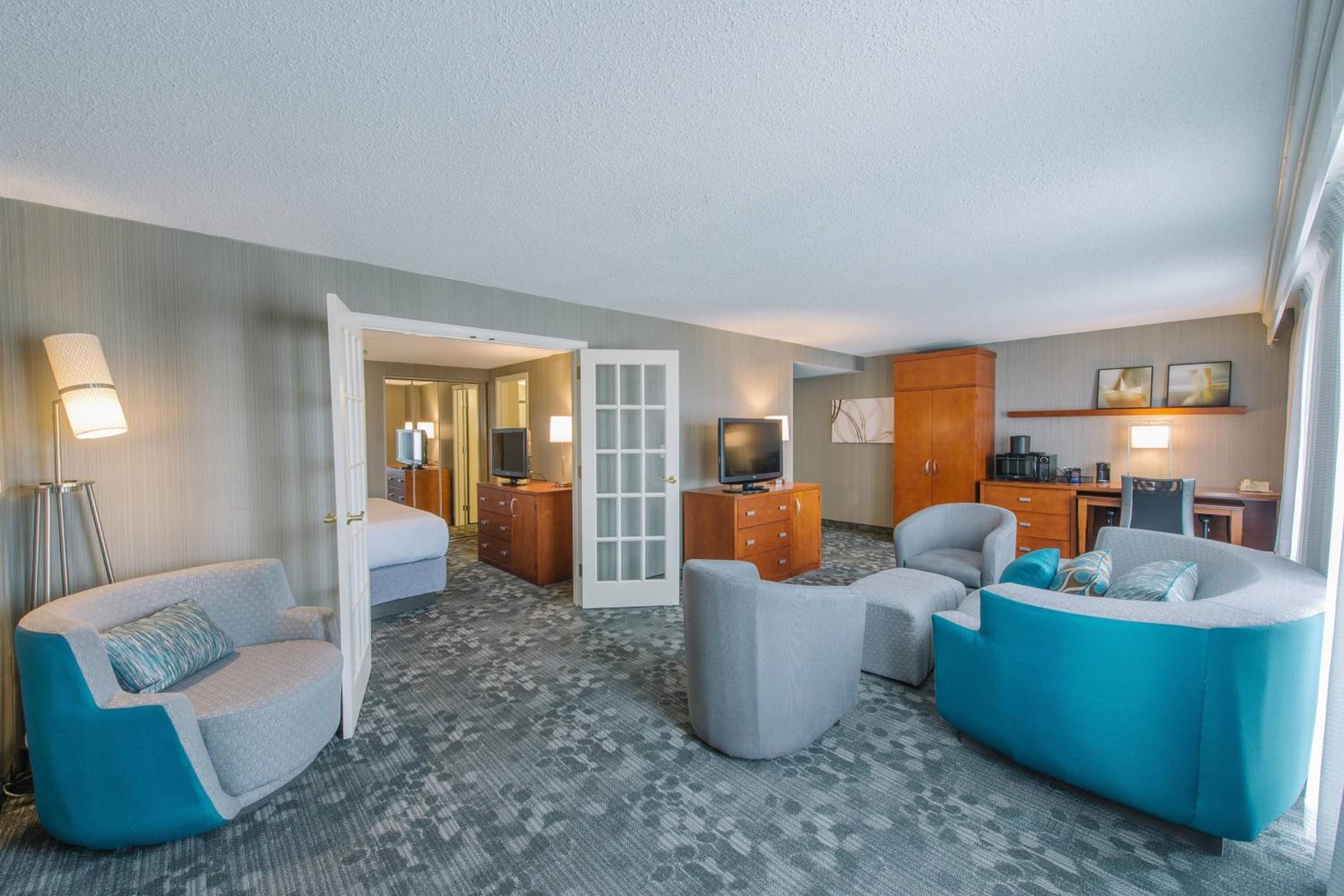 One-Bedroom King Suite with Roll-In Shower, Specialty Furniture and Sofa Bed - Mobility Access/Hearing Accessible - Photo 3
