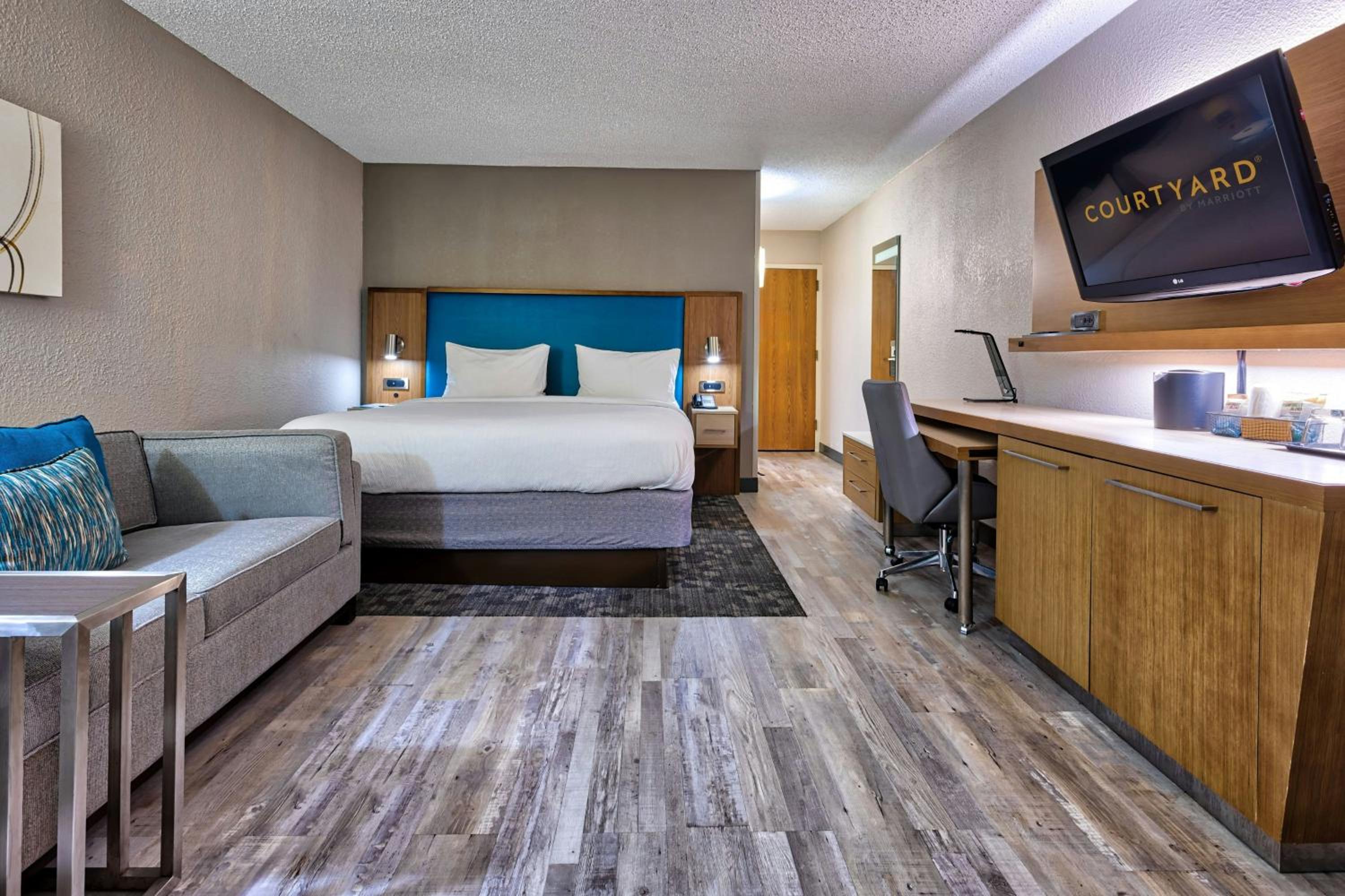 King Room with Sofa Bed and Roll-in Shower - Mobility and Hearing Accessible