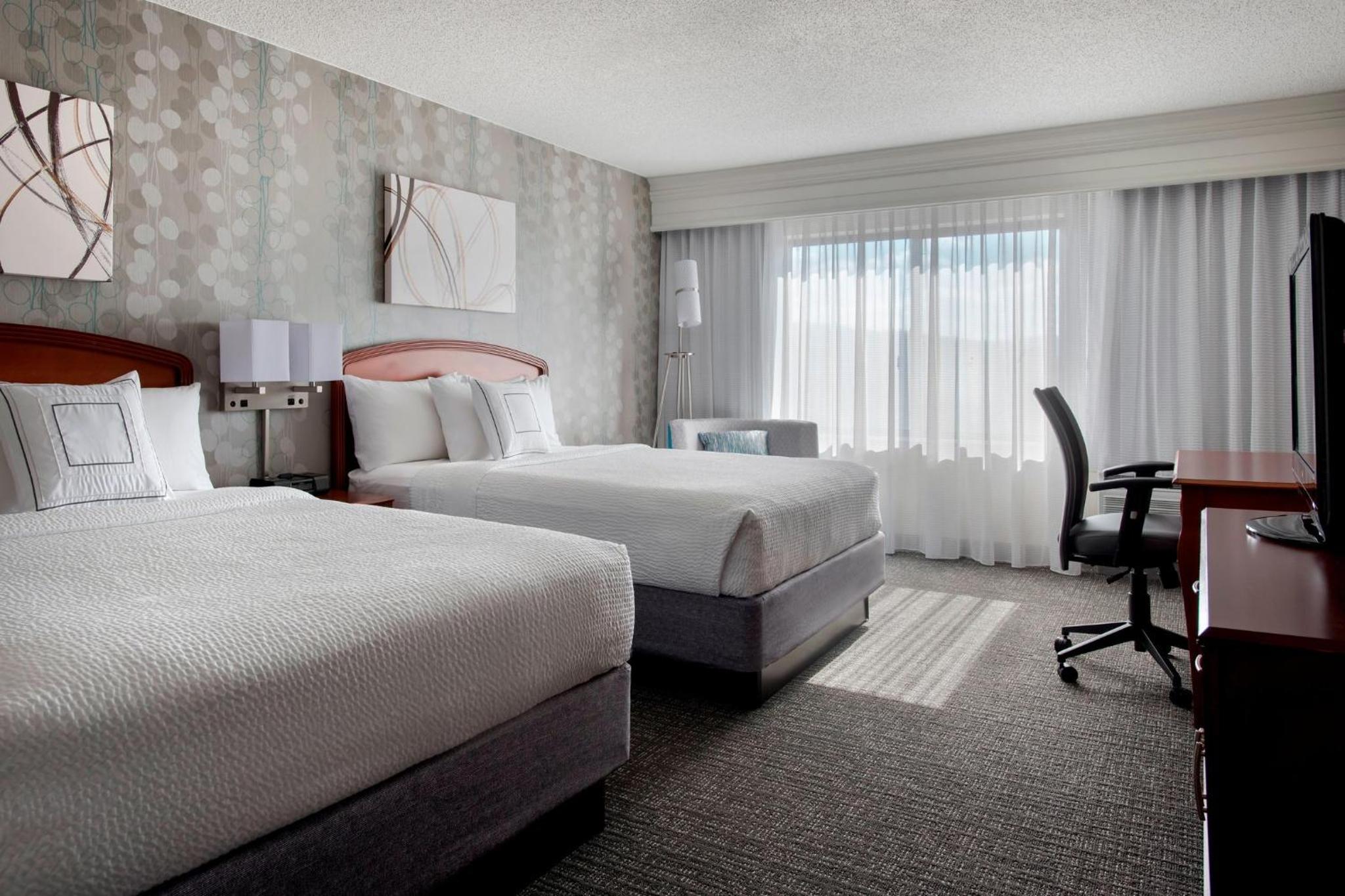 Queen Room with Two Queen Beds - Hearing Accessible - Photo 1