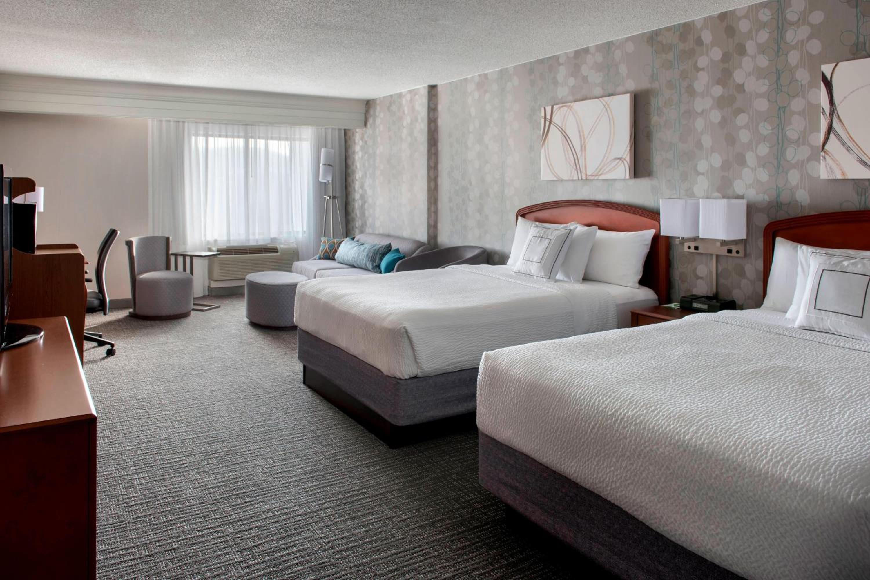 Queen Room with Two Queen Beds and Sofa Bed - Hearing Accessible - Photo 1