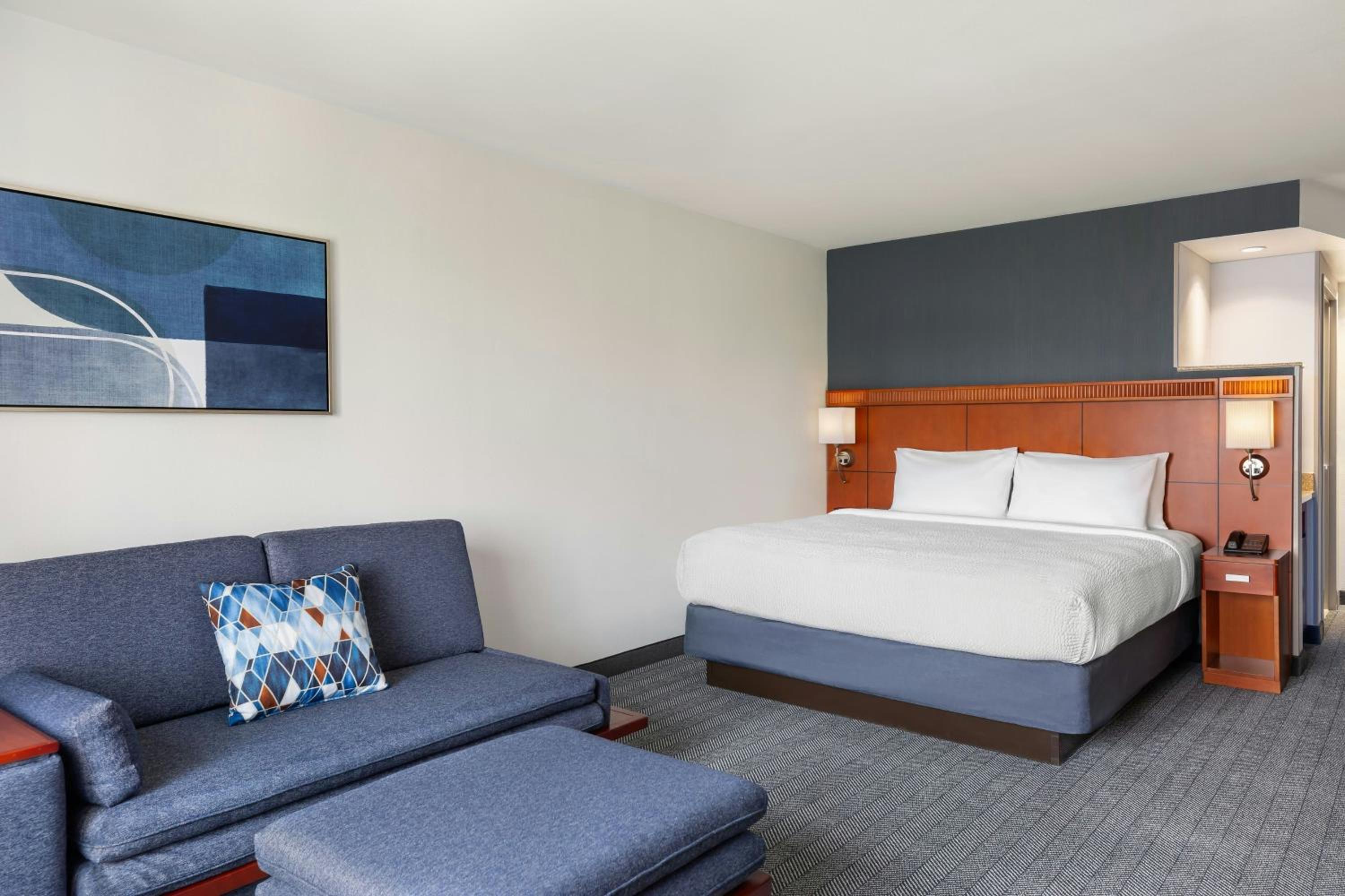 Newly Renovated King Room with Sofa Bed and Adapted Tub - Mobility and Hearing Accessible photo 1
