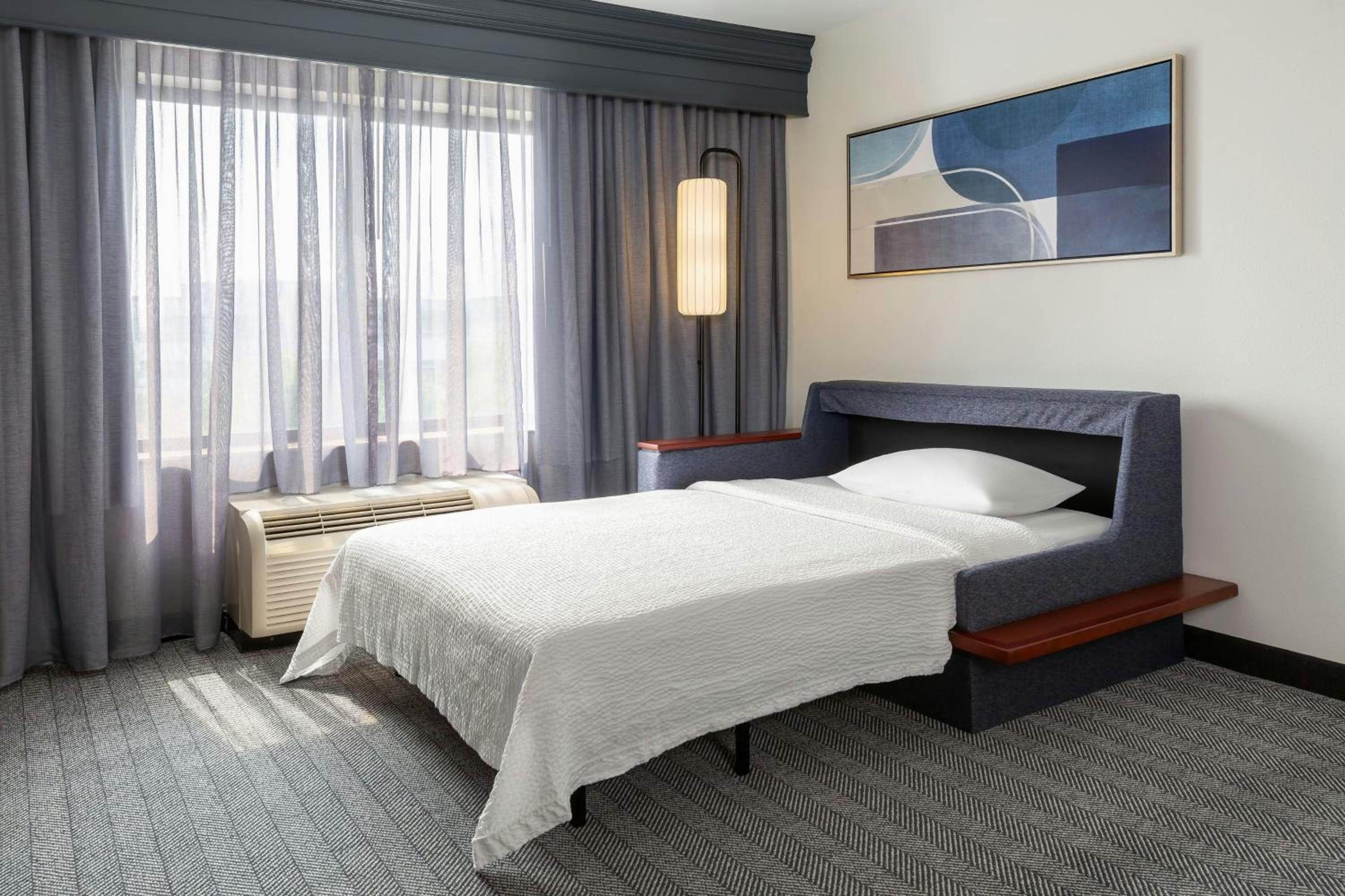 Newly Renovated King Room with Sofa Bed and Adapted Tub - Mobility and Hearing Accessible photo 3