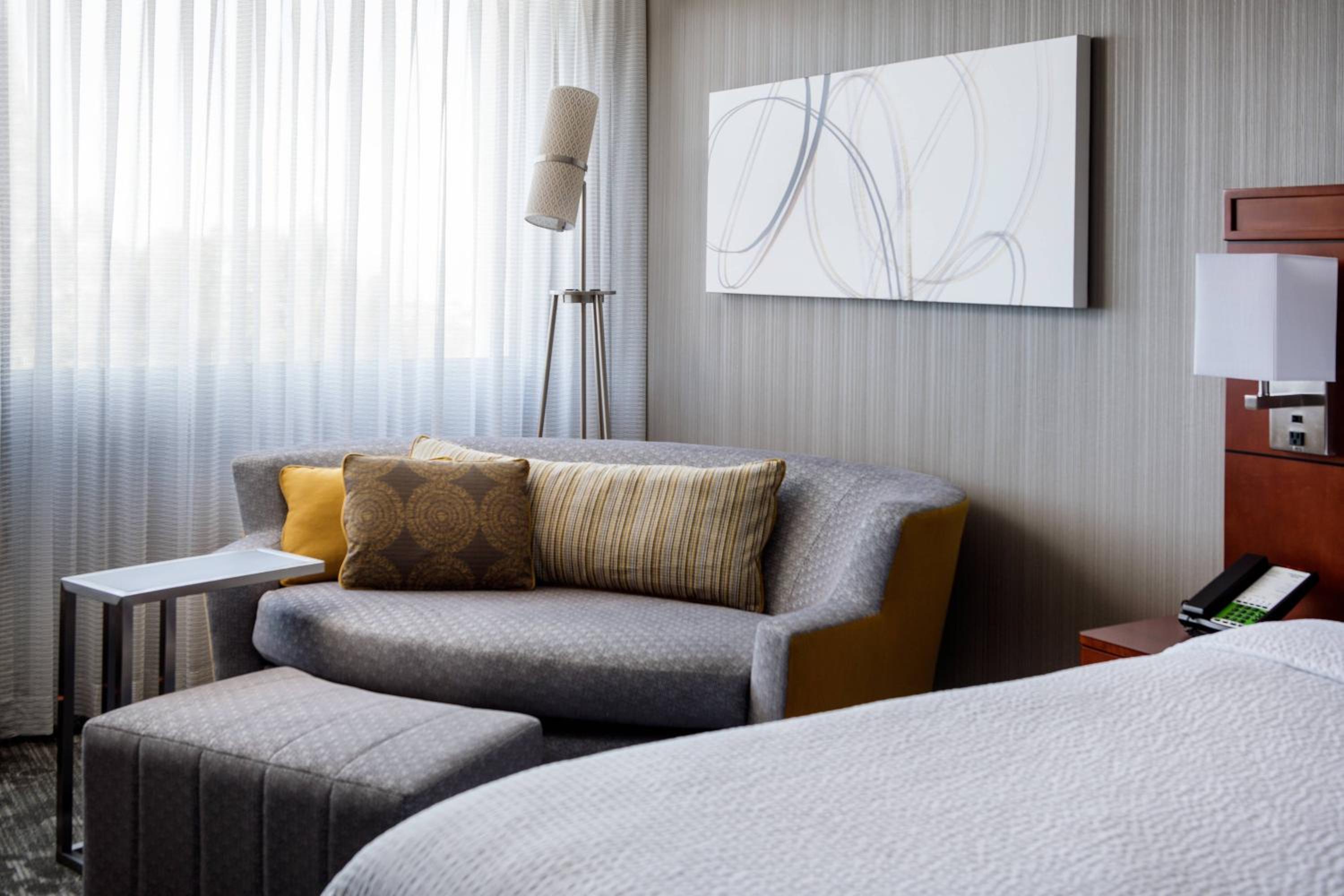 Newly renovated King Room with Sofa Bed -Hearing Accessible - Photo 2