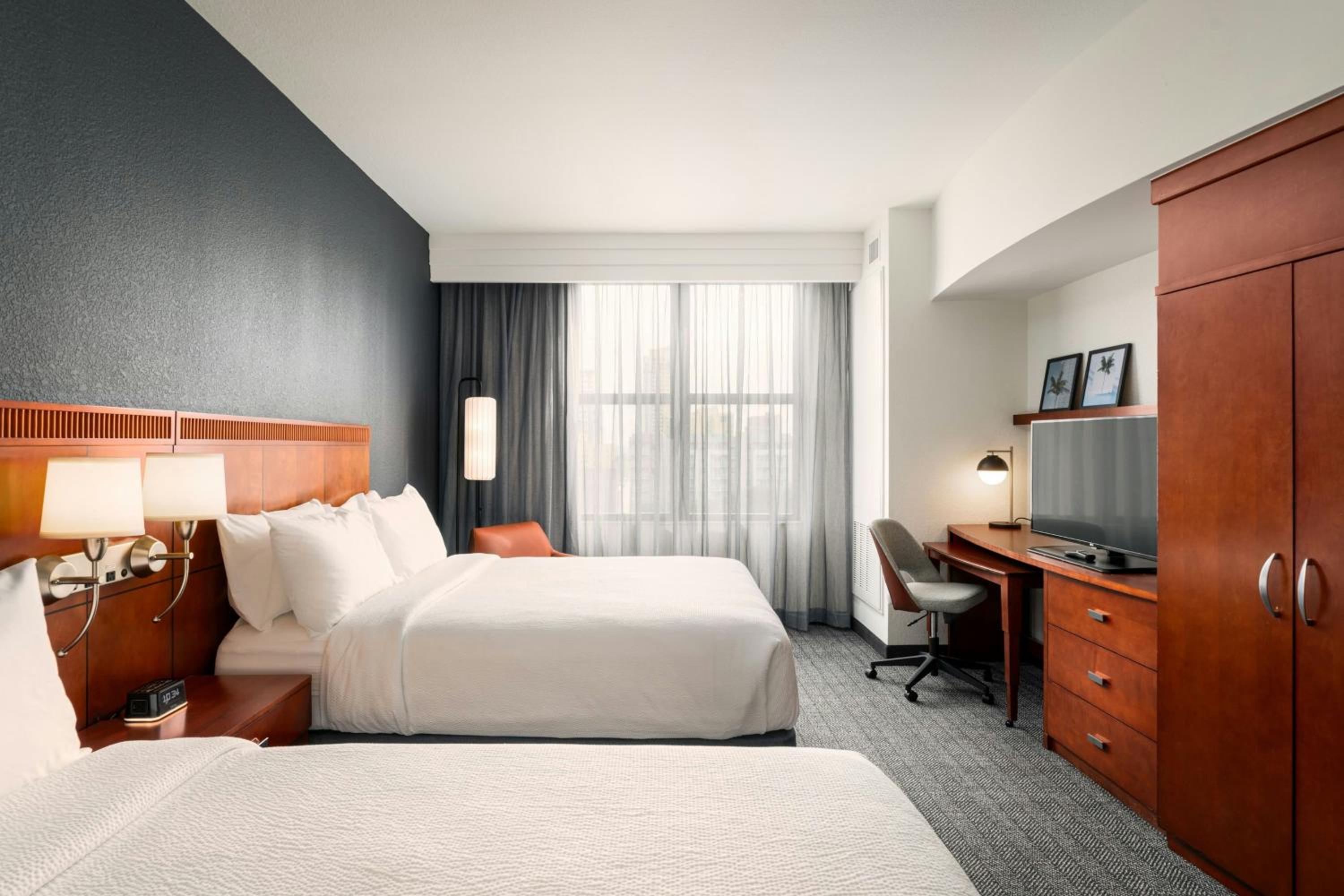 Queen Room with Two Queen Beds and Bathtub - Mobility Access/Hearing Accessible - Photo 1