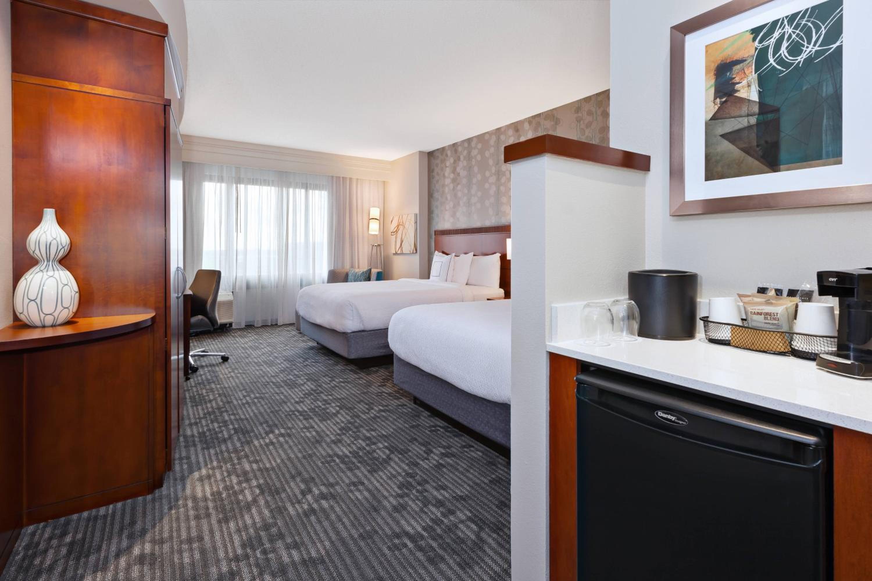 Queen Room with Two Queen Beds - Hearing Accessible - Photo 1