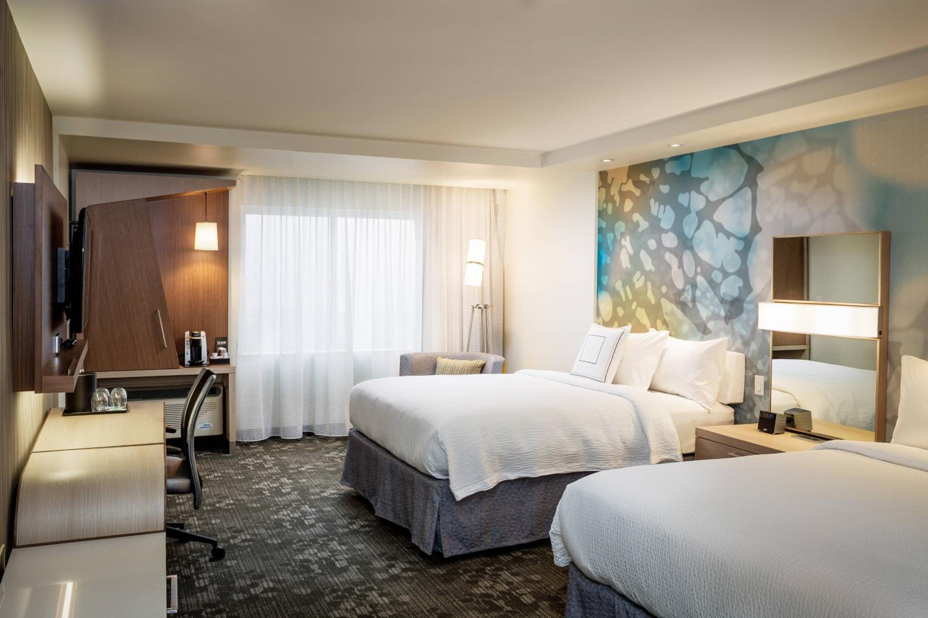 Queen Room with Two Queen Beds - Hearing Accessible photo 1