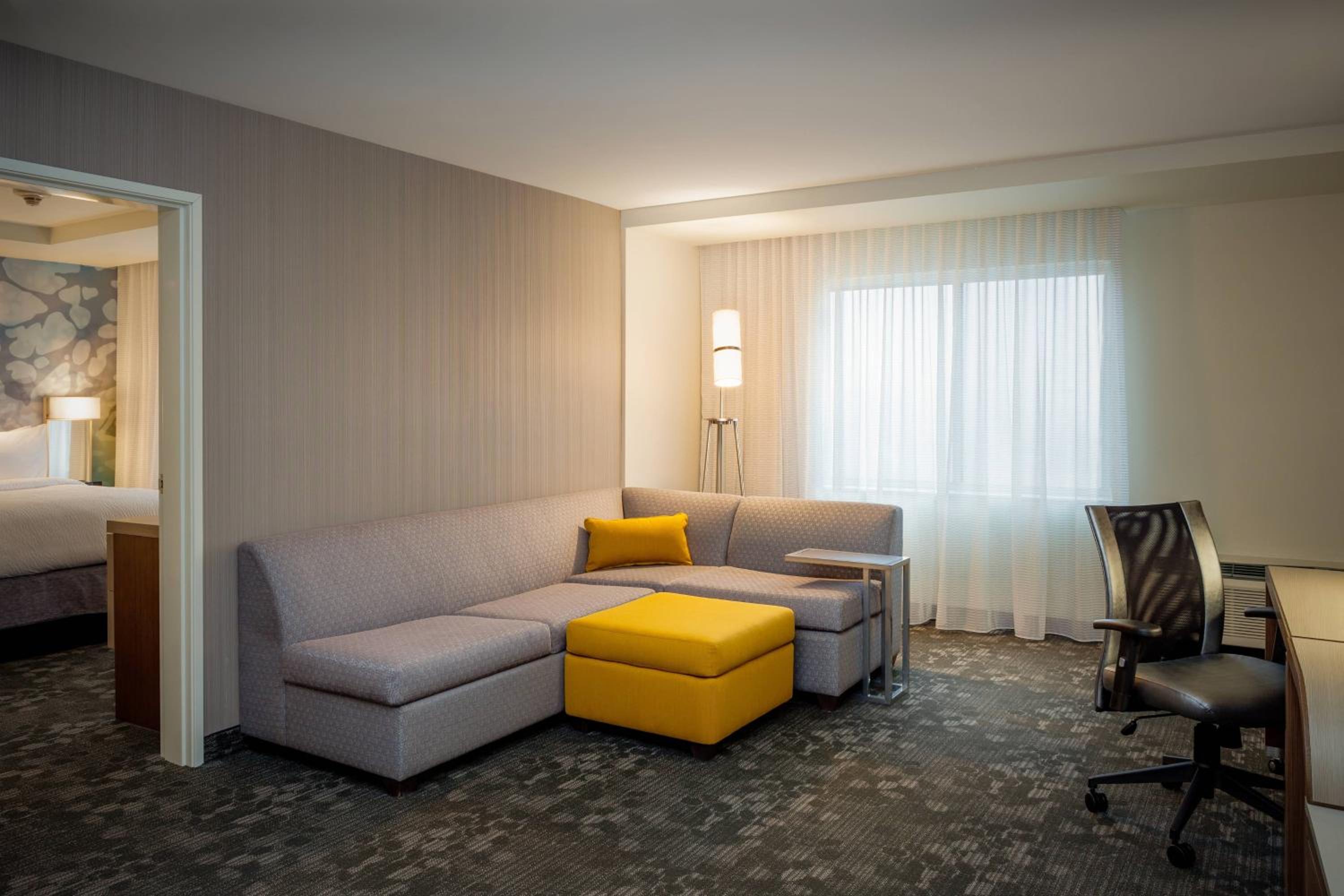 One-Bedroom King Suite with Roll-In Shower and Sofa Bed - Mobility Access/Hearing Accessible