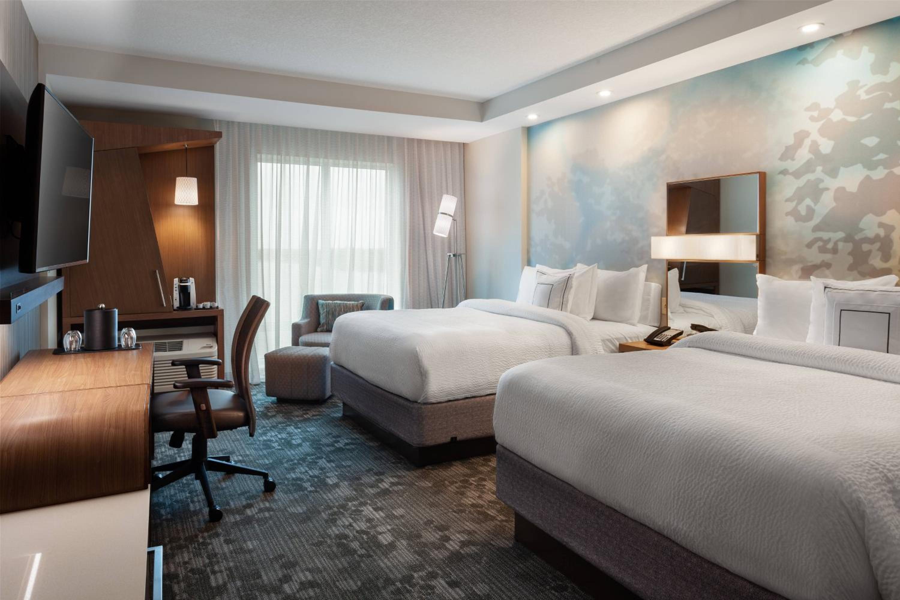 Deluxe Queen Room with Two Queen Beds - Photo 1