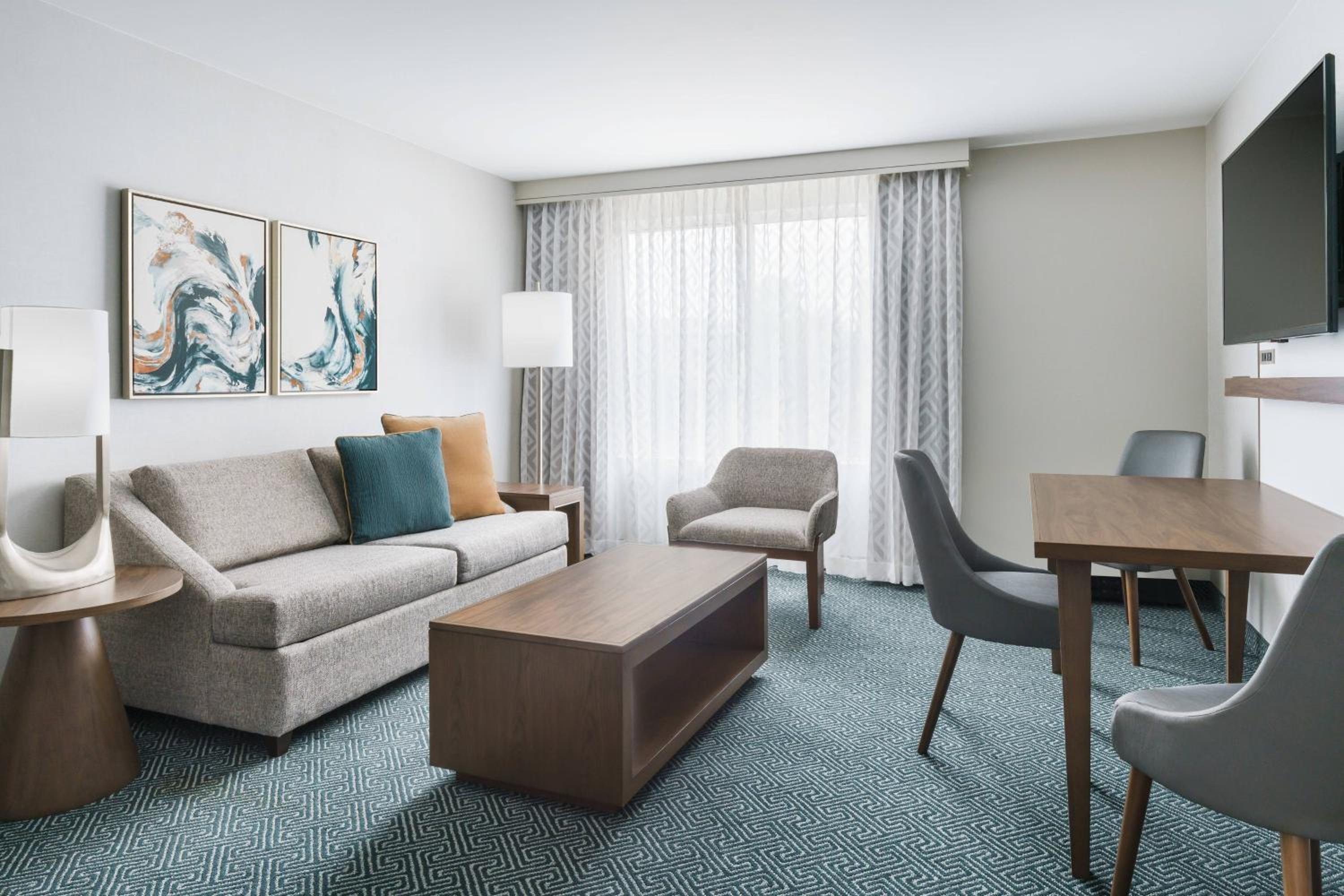 Queen Suite with Two Queen Beds, Courtyard Access, Roll-In Shower, Transfer Shower and Sofa Bed - Mobility Access/Hearing Accessible