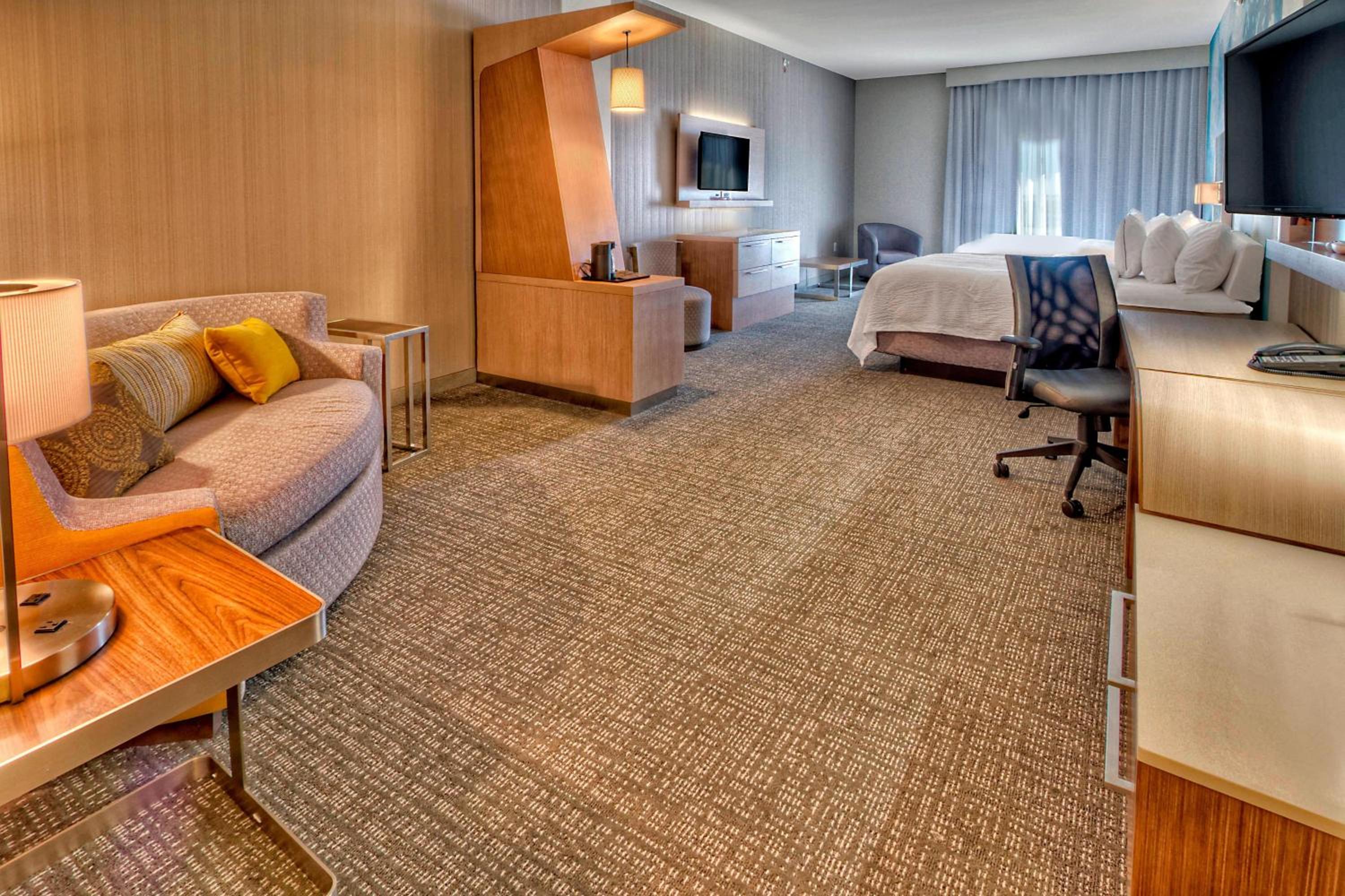 Queen Suite with Two Queen Beds and Sofa Bed photo 1