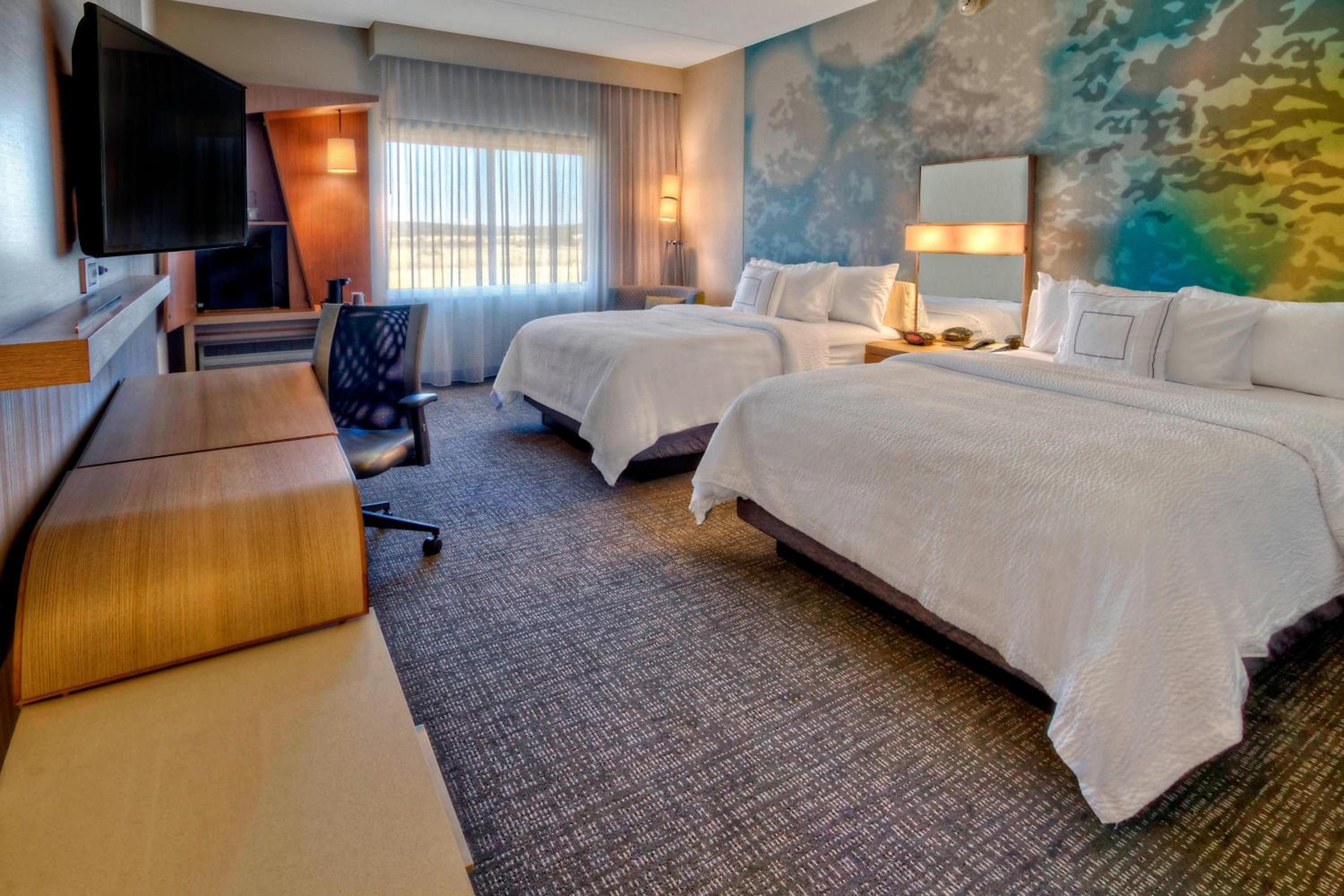 Queen Room with Two Queen Beds and Sofa Bed photo 1