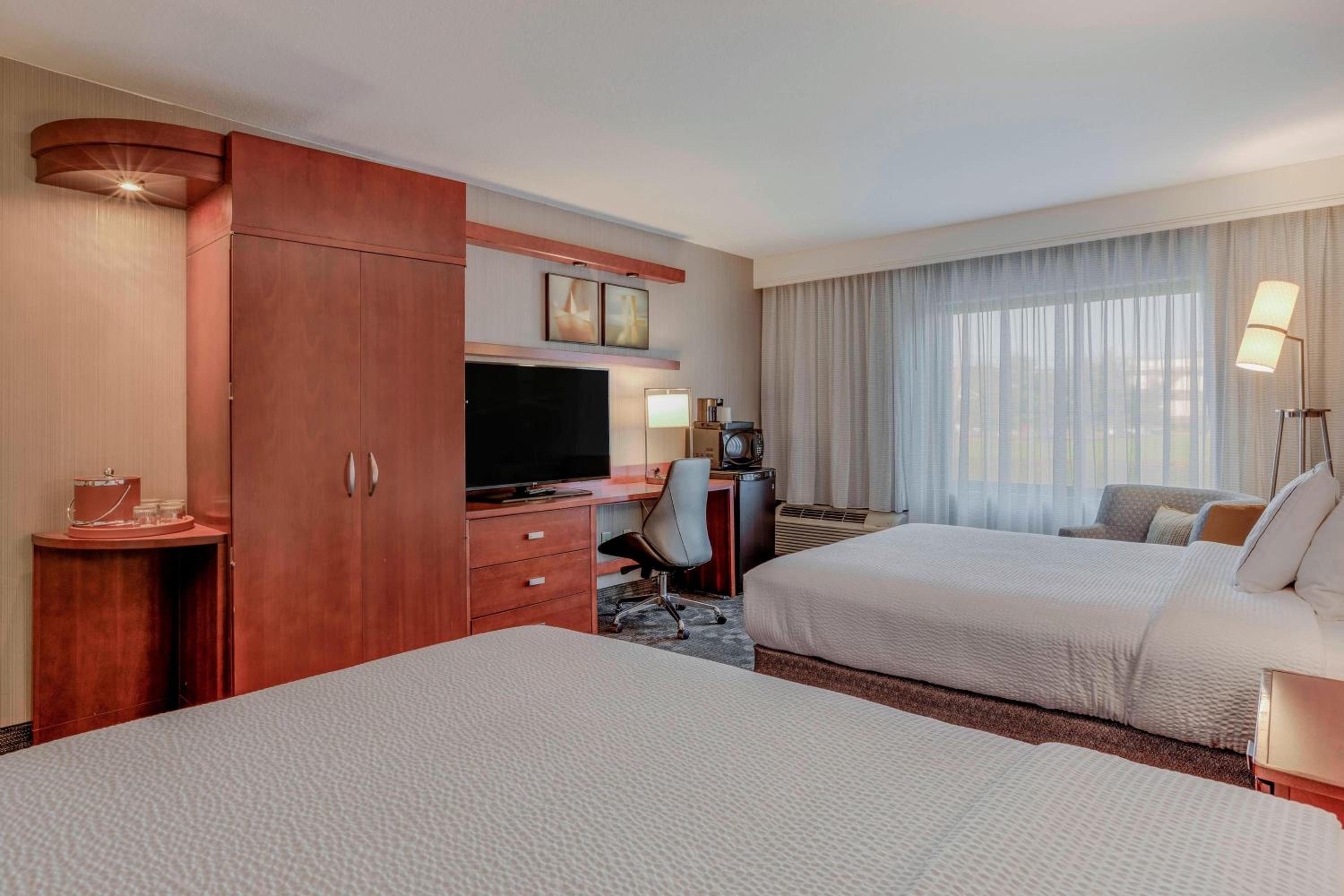 Queen Room with Two Queen Beds - Hearing Accessible - Photo 1