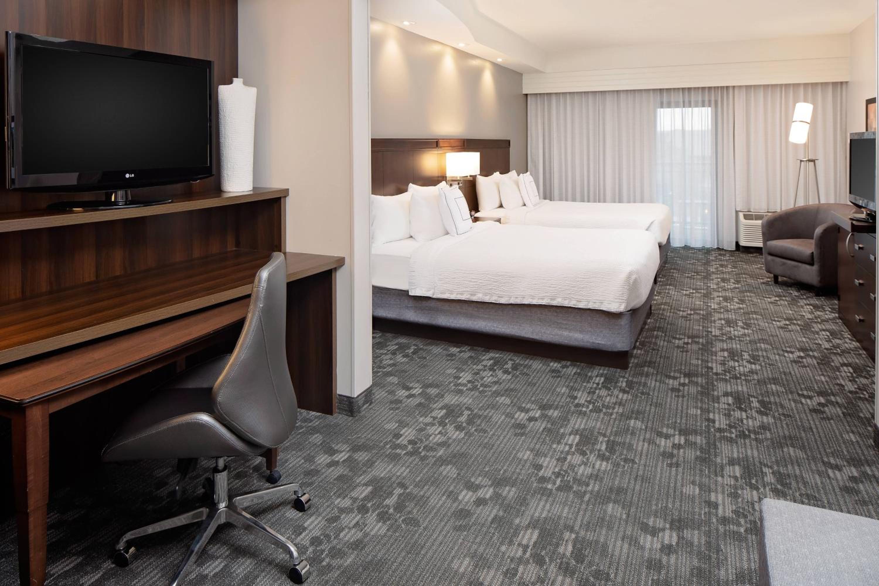Queen Suite with Two Queen Beds and Sofa Bed - Hearing Accessible - Photo 1