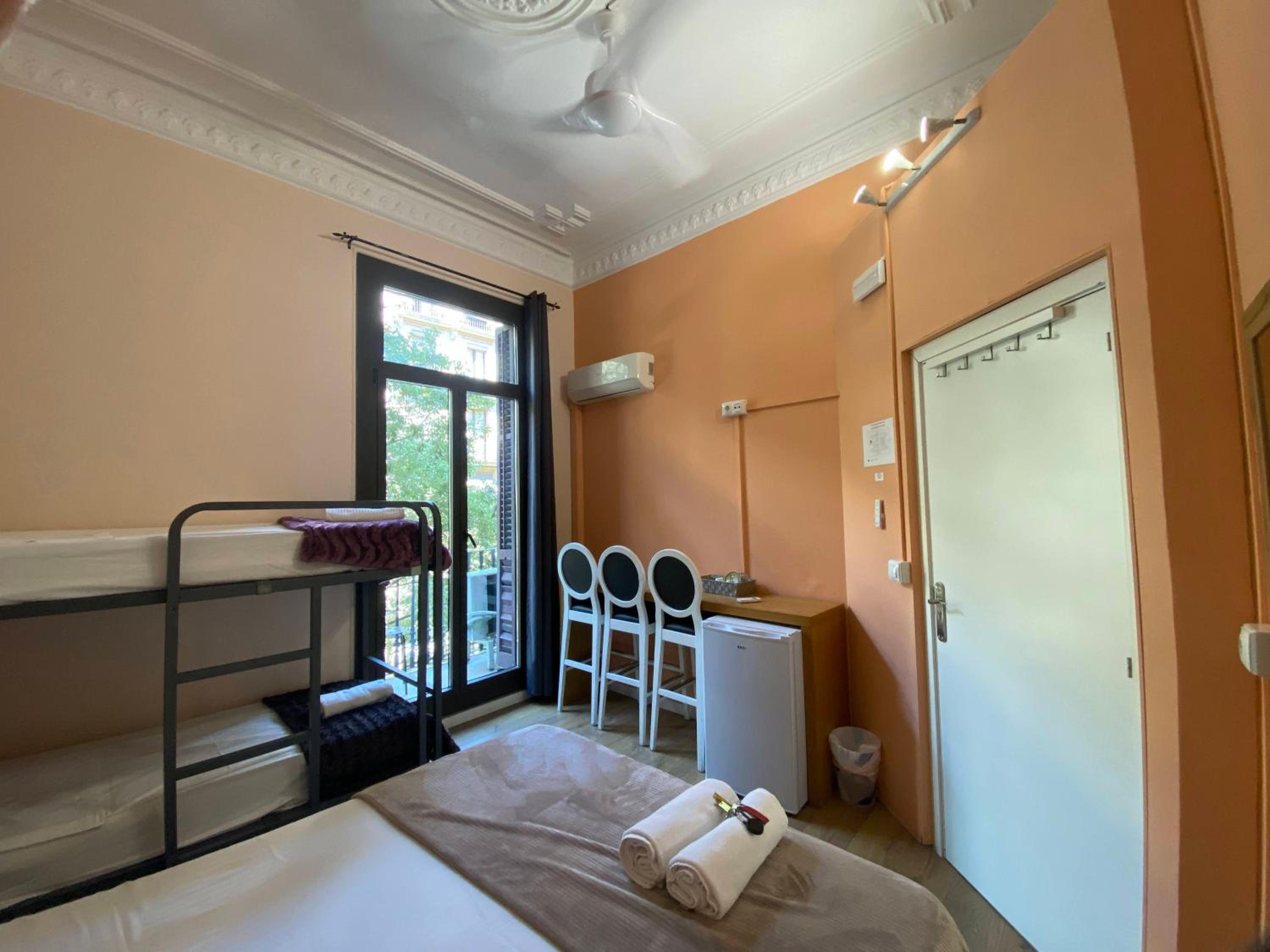 Double room with an extra bed and private external bathroom.