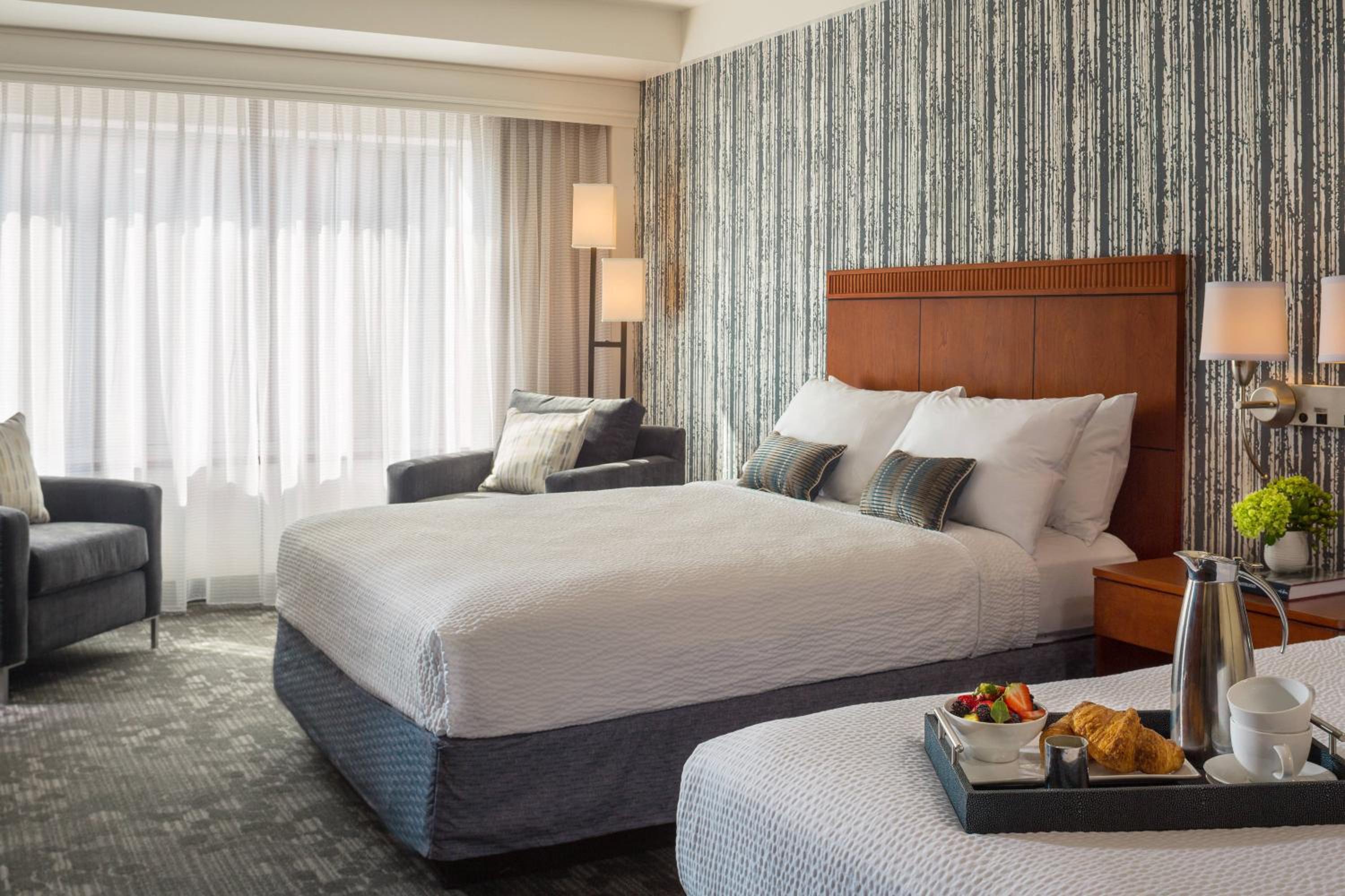 Queen Room with Two Queen Beds with Roll-In Shower and City View - Mobility Accessible - Photo 1