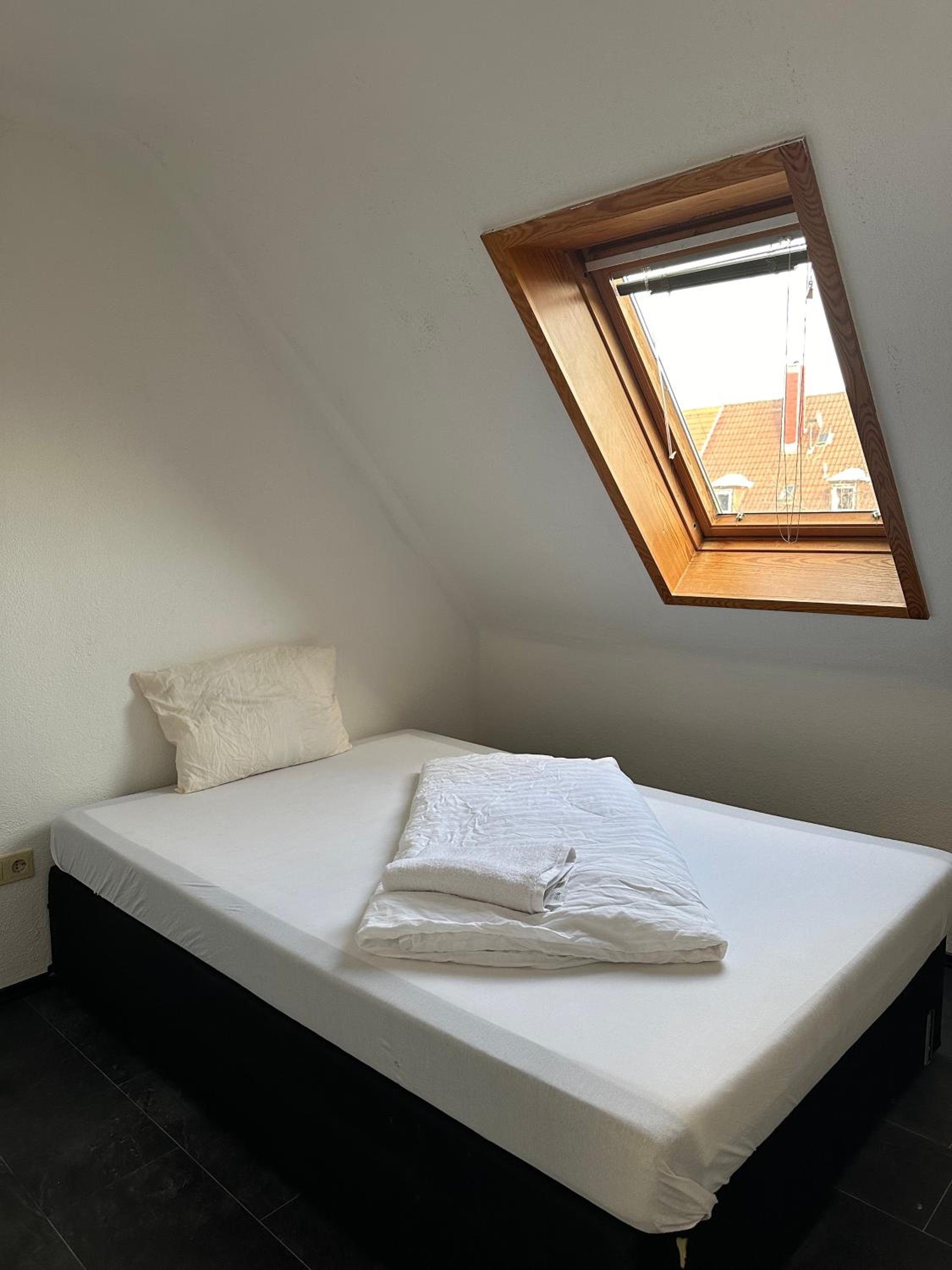 Single Room with Shared Shower and Toilet