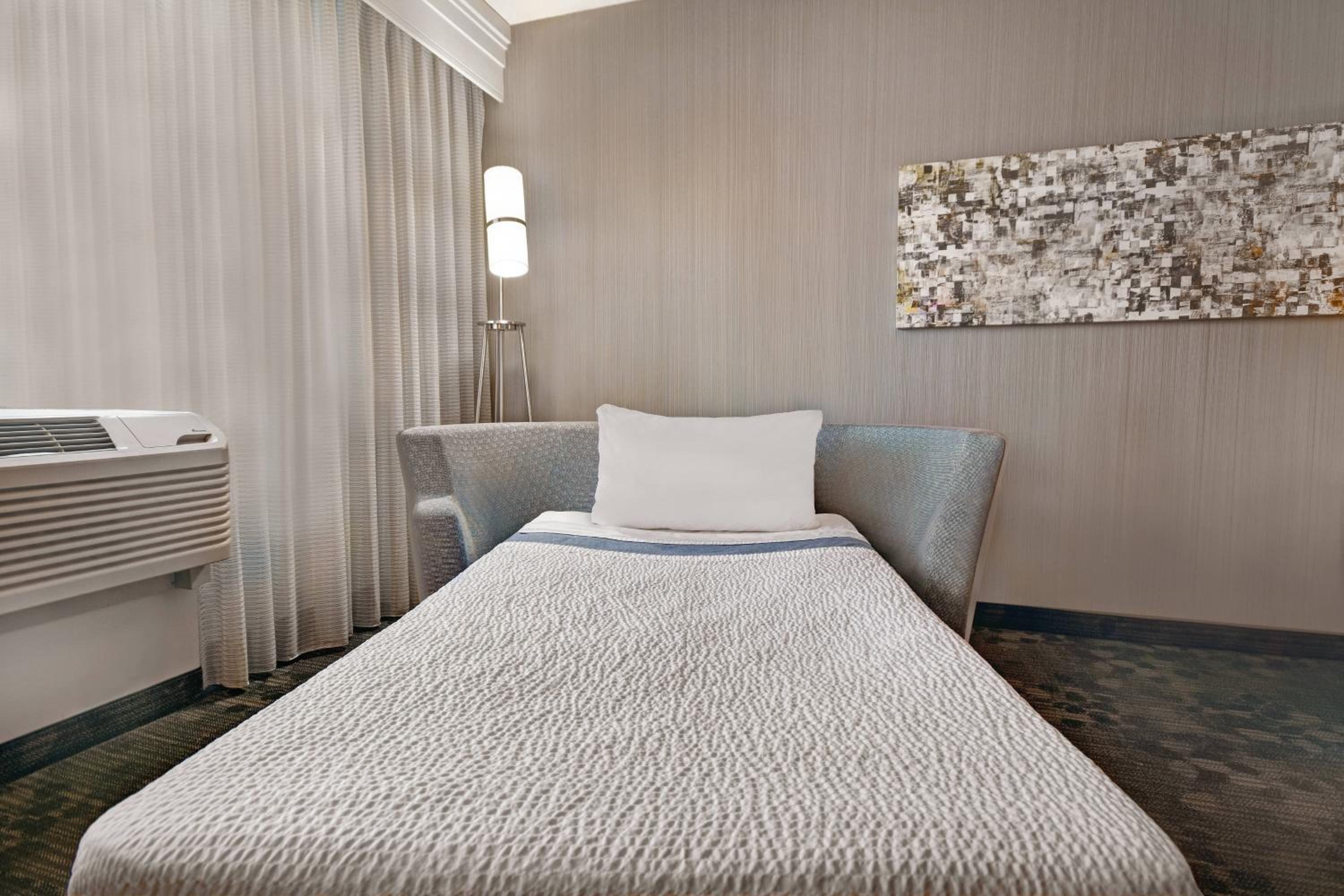King Room with Sofa Bed and Roll-in Shower - Mobility and Hearing Accessible photo 2