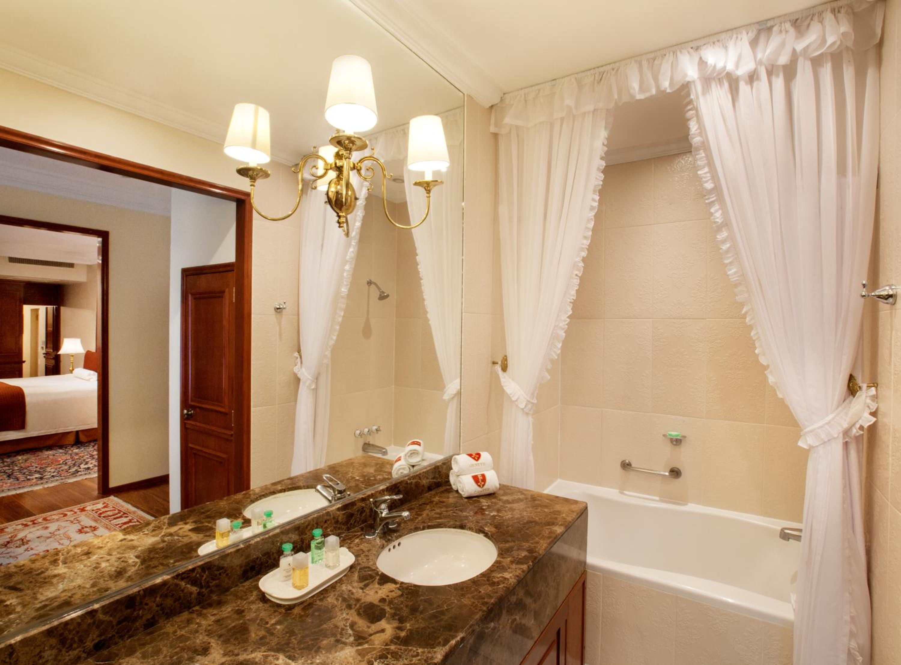 Relax in luxury with a serene spa-like ambiance.