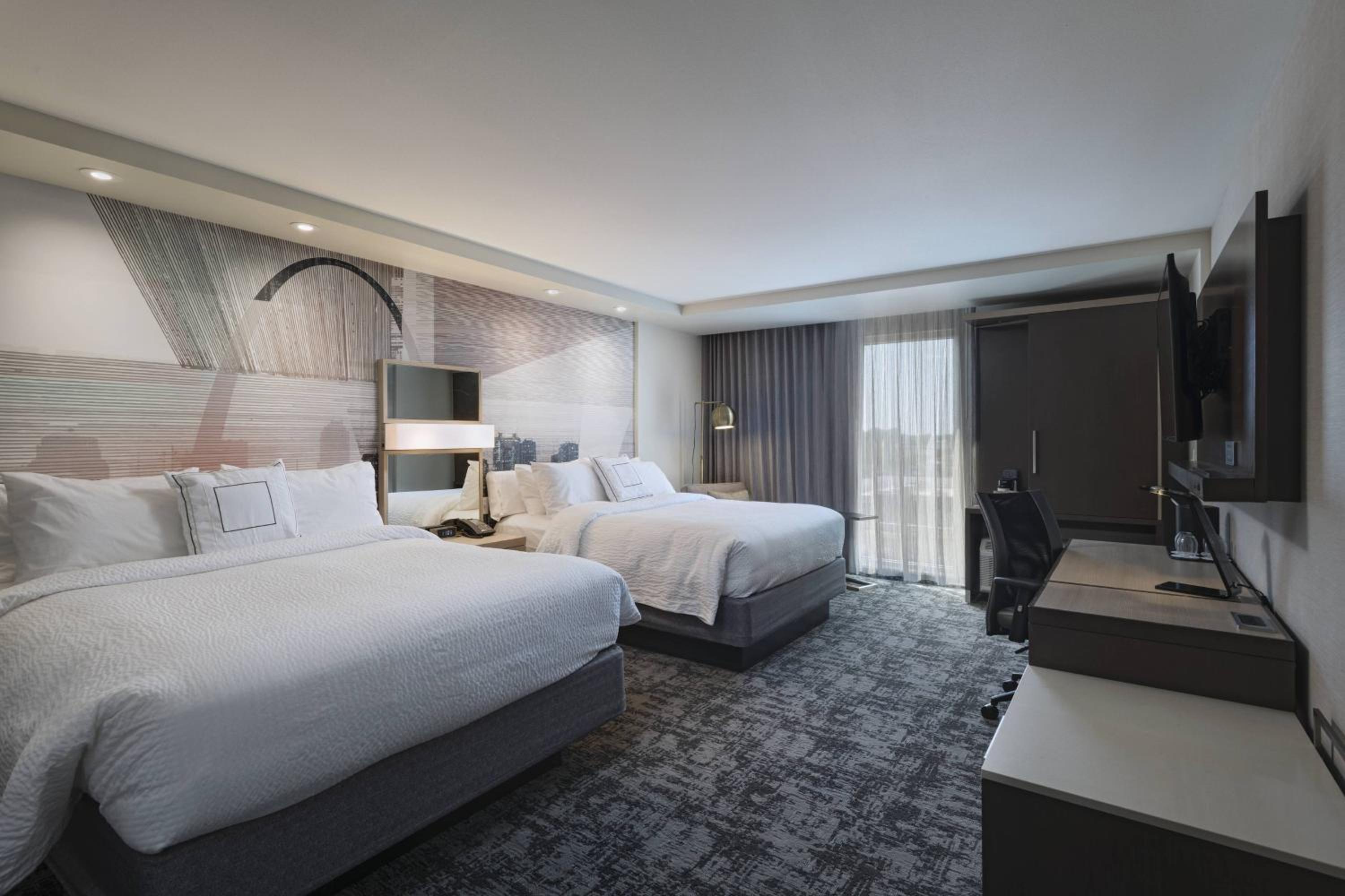 One-Bedroom Suite with Two Queen Beds and Sofa Bed - Mobility and Hearing Accessible with Roll-in Shower