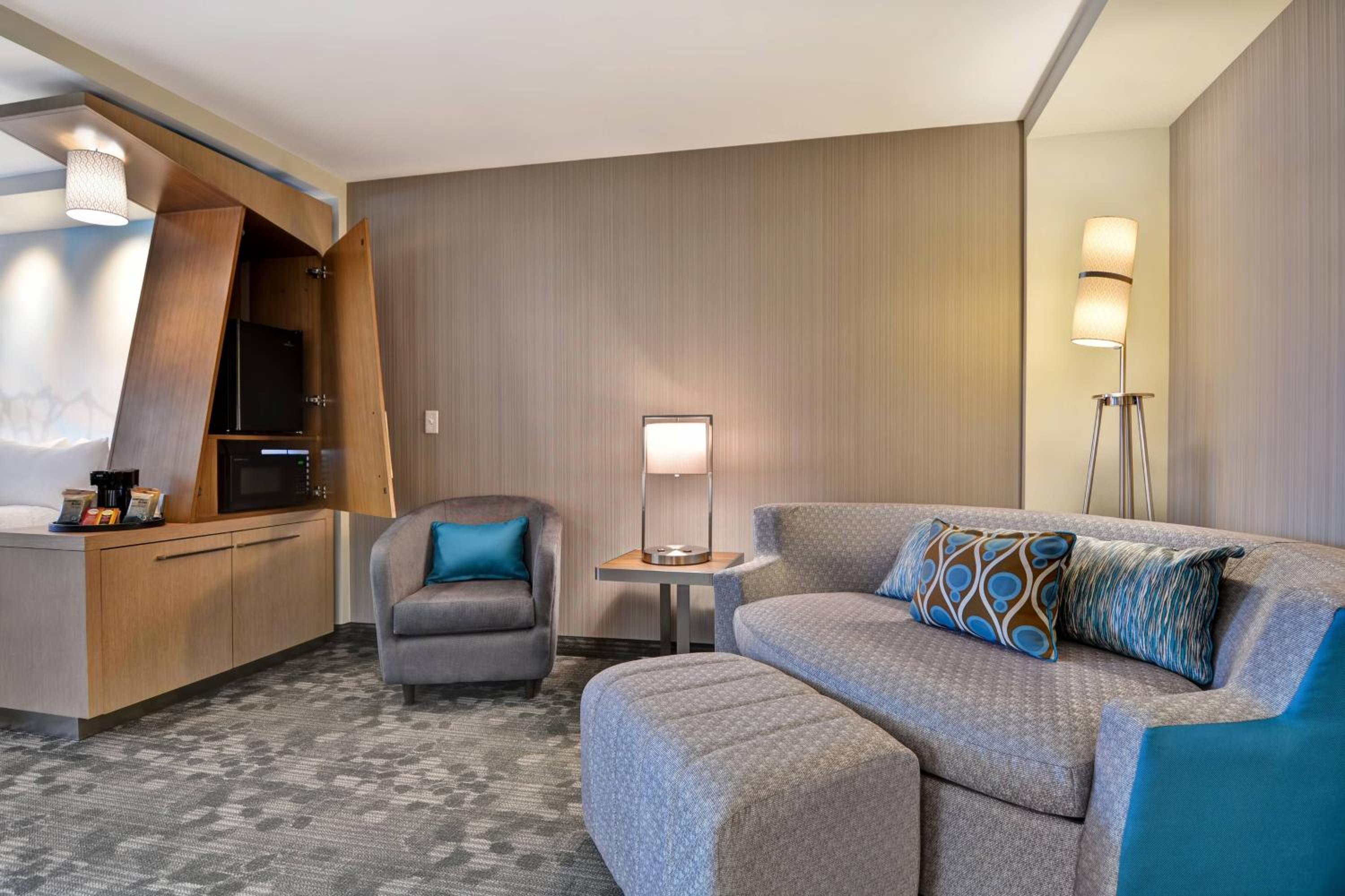 Queen Room with Two Queen Beds and Sofa Bed - Hearing Accessible photo 1