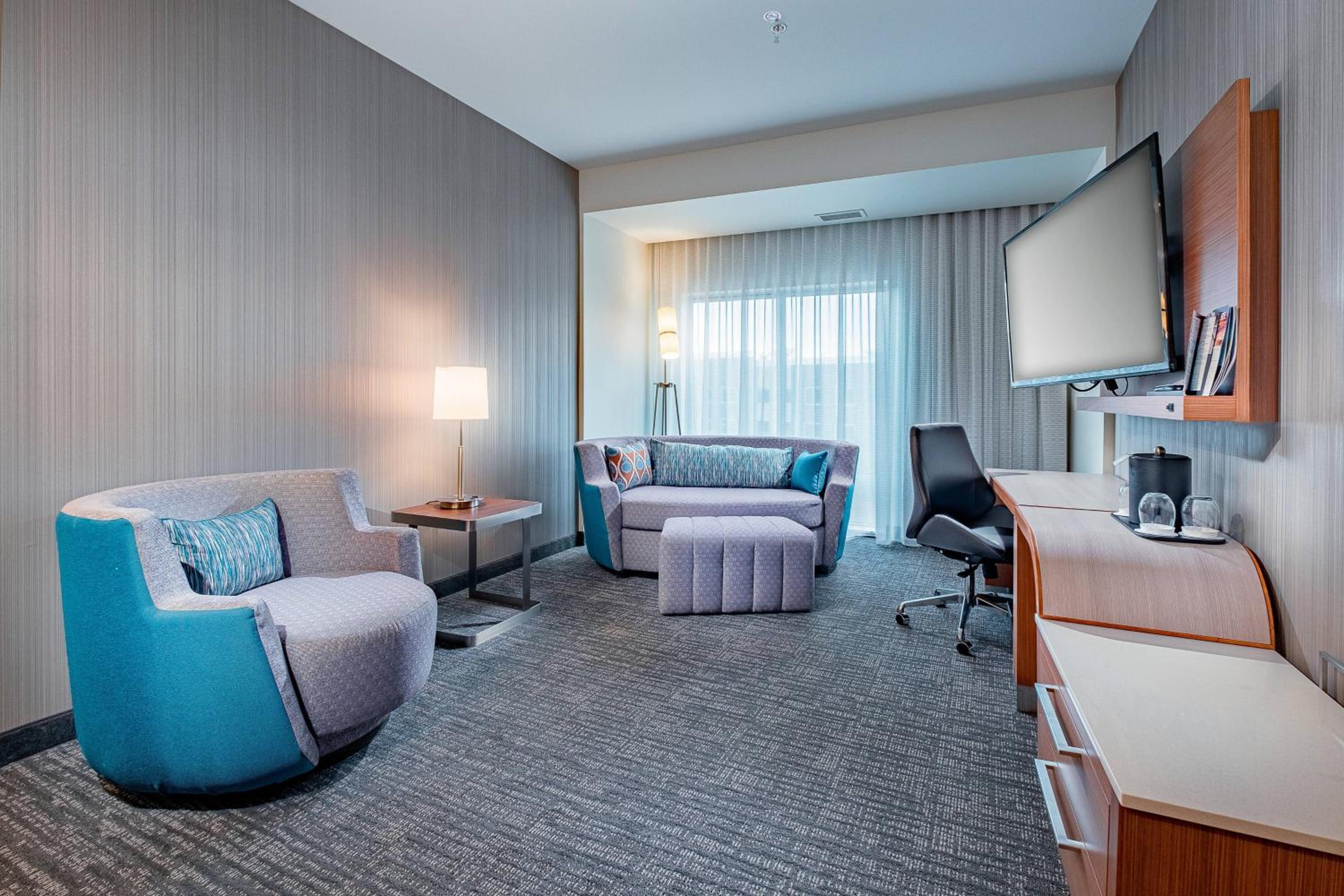 King Suite with Roll-In Shower and Sofa Bed - Mobility Access/Hearing Accessible photo 2