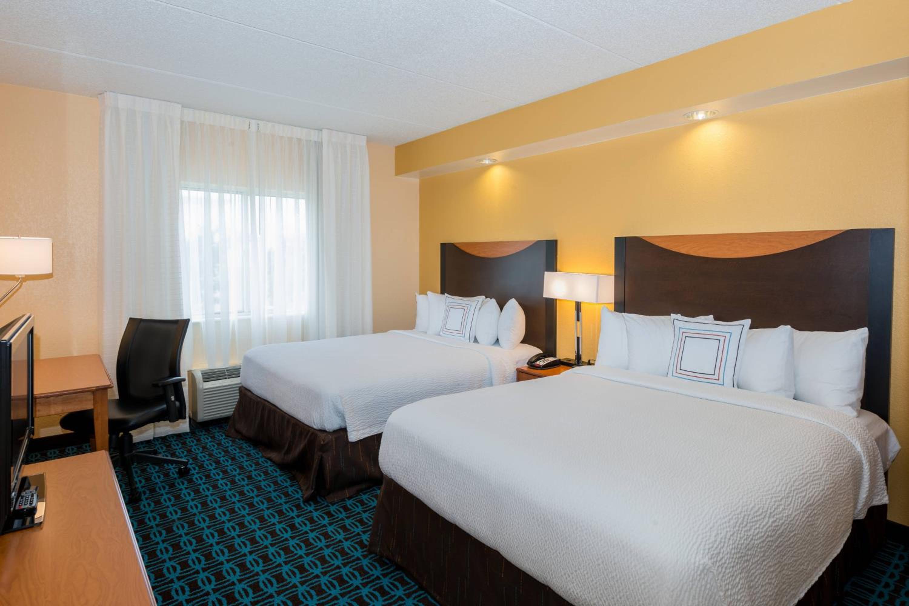 Queen Room with Two Queen Beds - Hearing Accessible - Photo 1