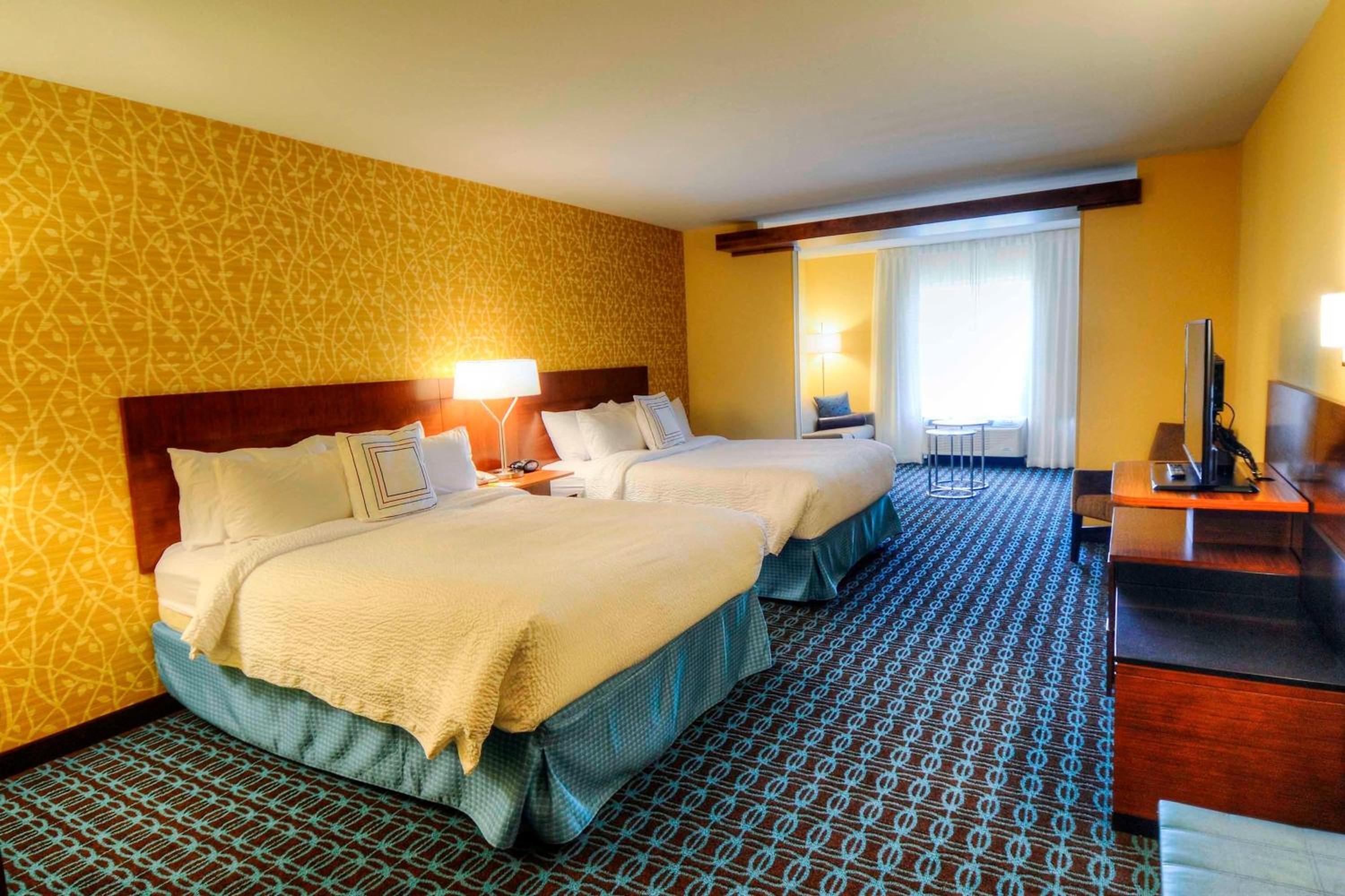 Queen Suite with Two Queen Beds and Sofa Bed