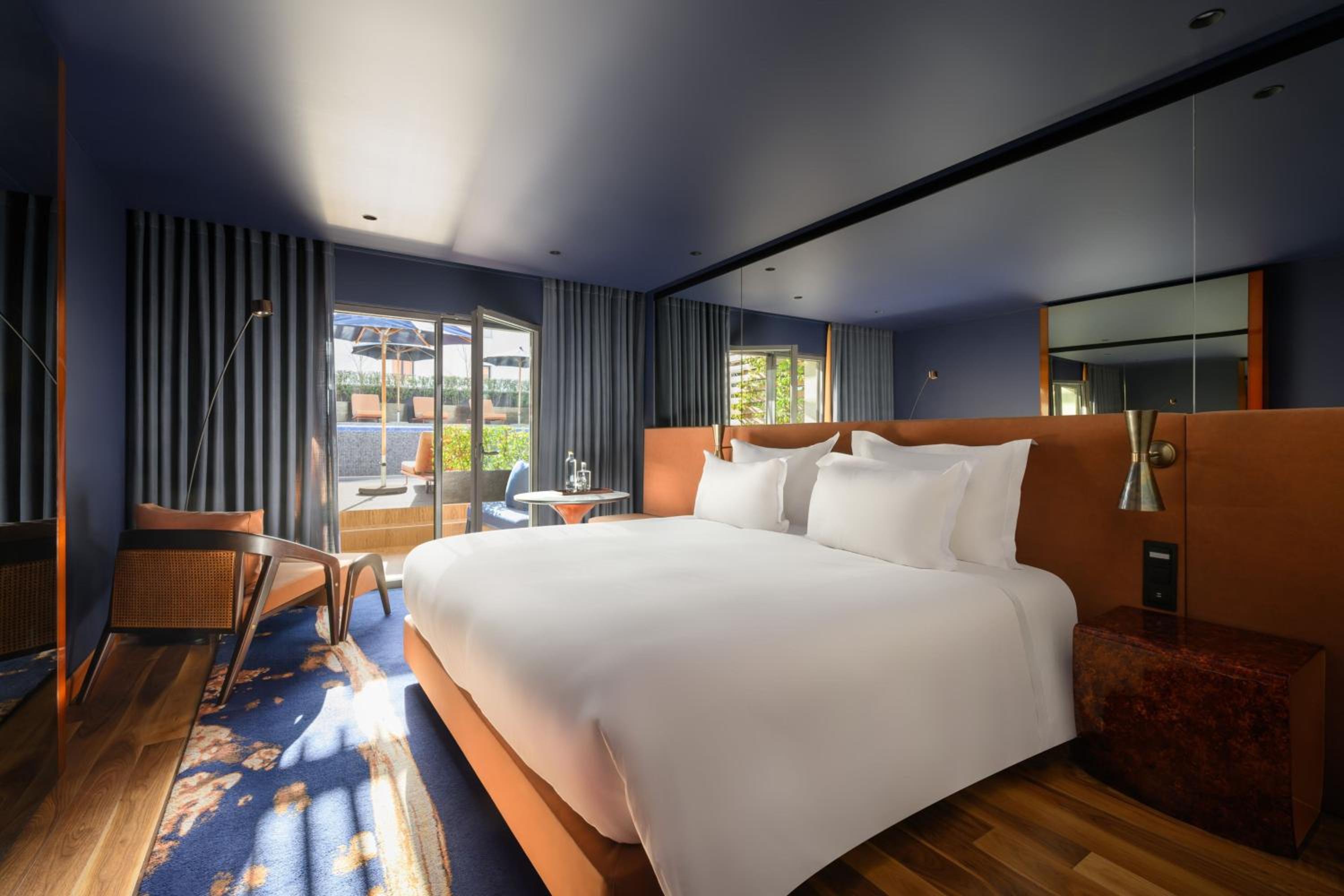 Deluxe King Room with Terrace and Pool View