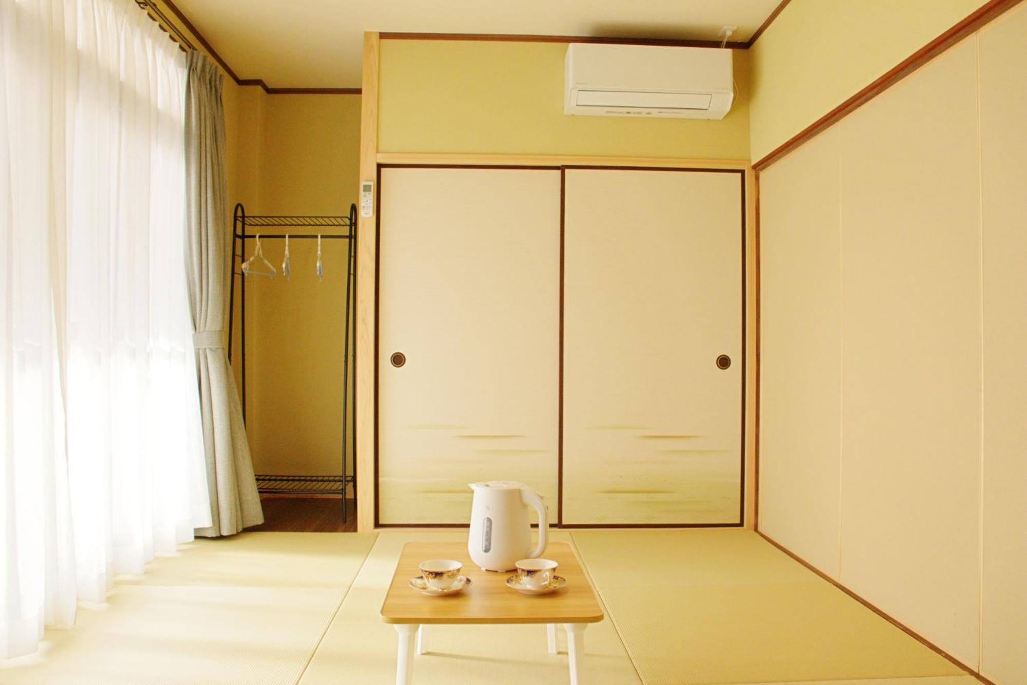 Economy Triple Room with Shared Bathroom
