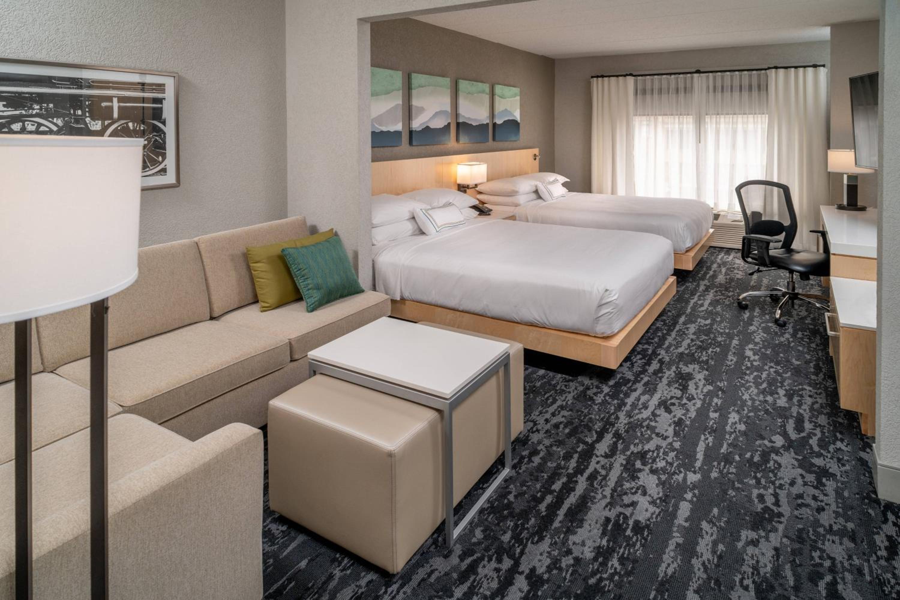 Queen Room with Two Queen Beds and Sofa Bed - Hearing Accessible - Photo 1