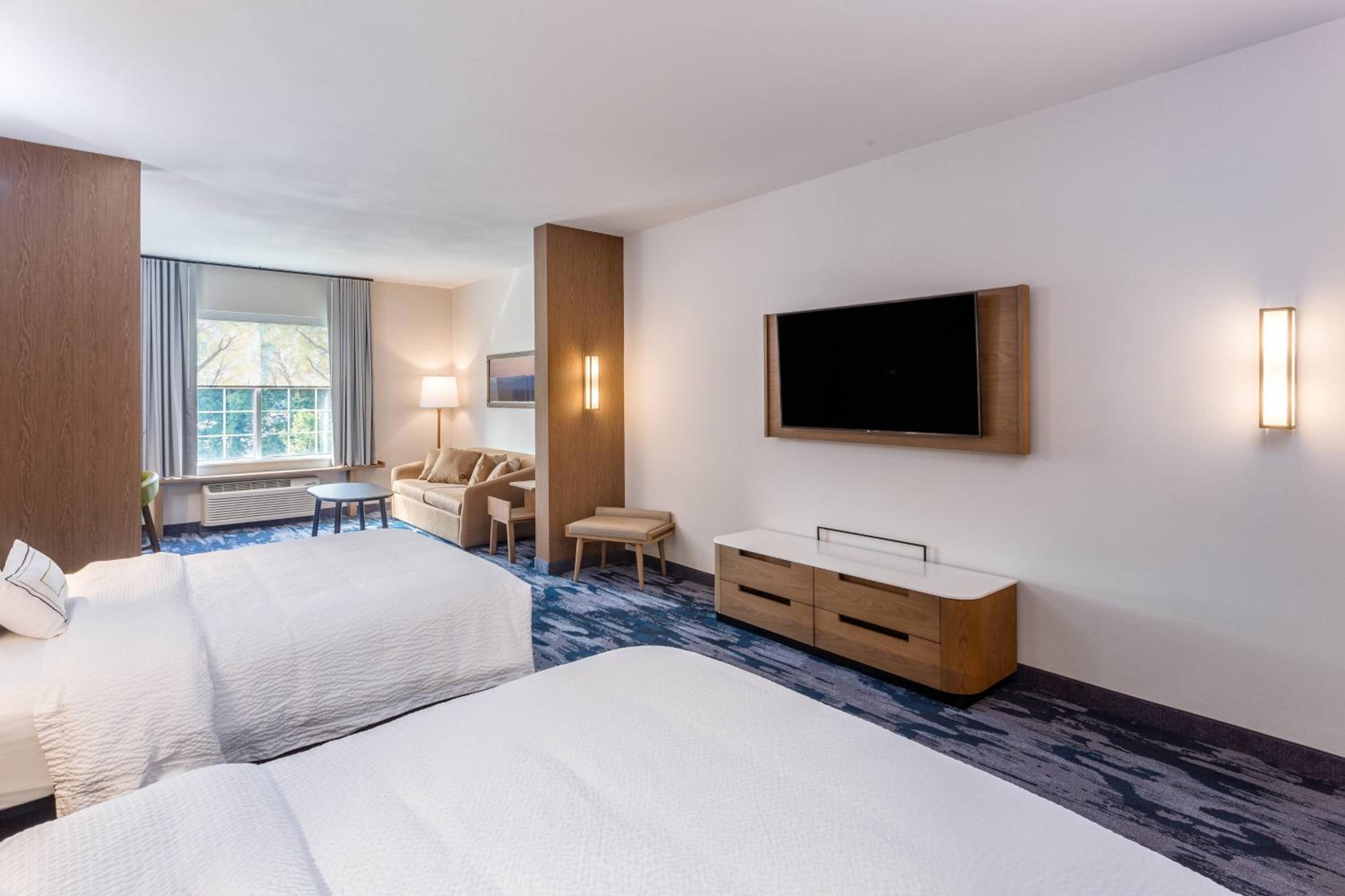 Queen Suite with Two Queen Beds and Sofa Bed